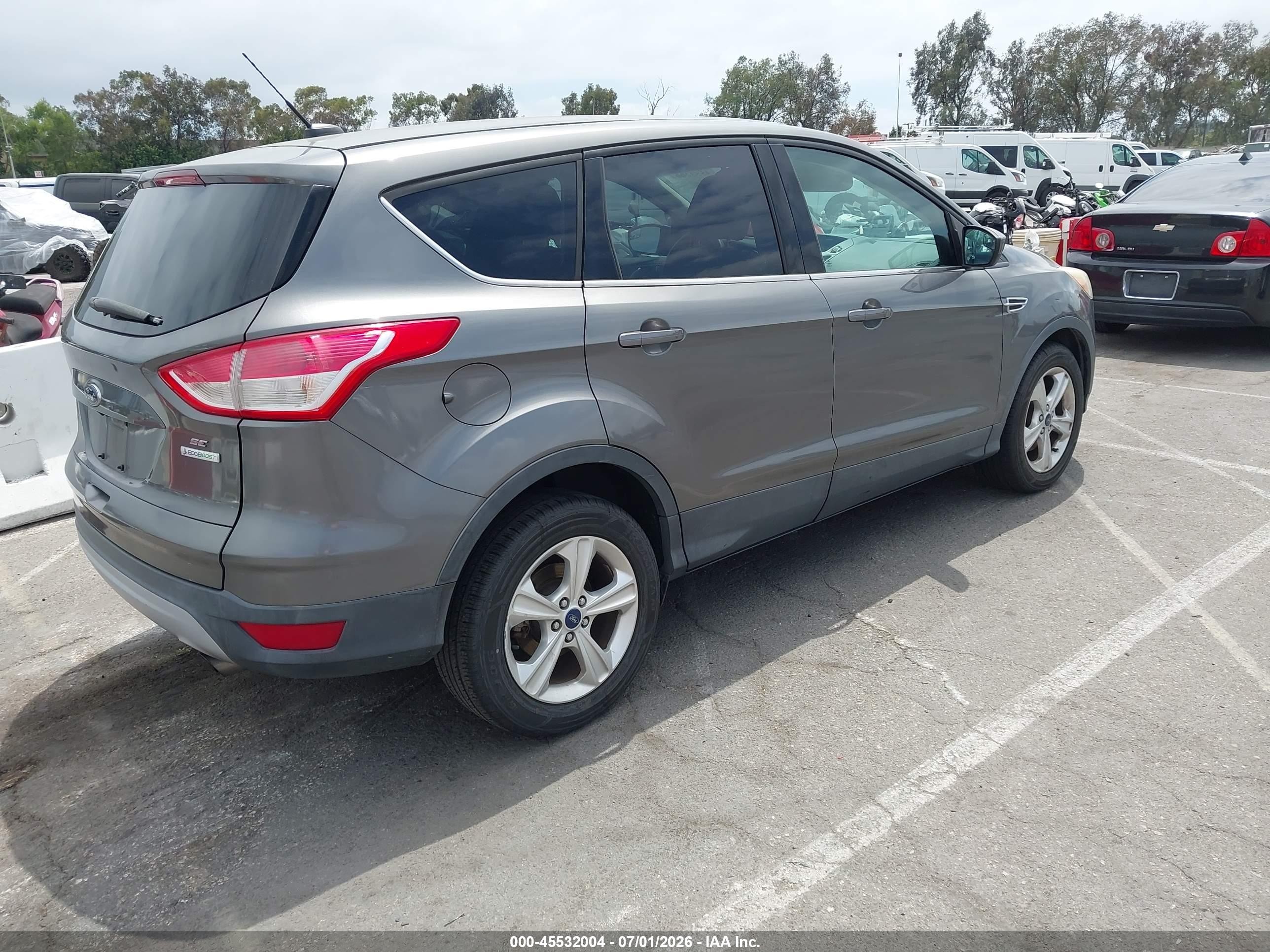 2014 Ford Escape VIN 1FMCU0GXXEUC61703 IAAI salvage auction — Normal Wear, Clear - Dealer Only (California), sold $300 on 2026-07-09 (photo 4)