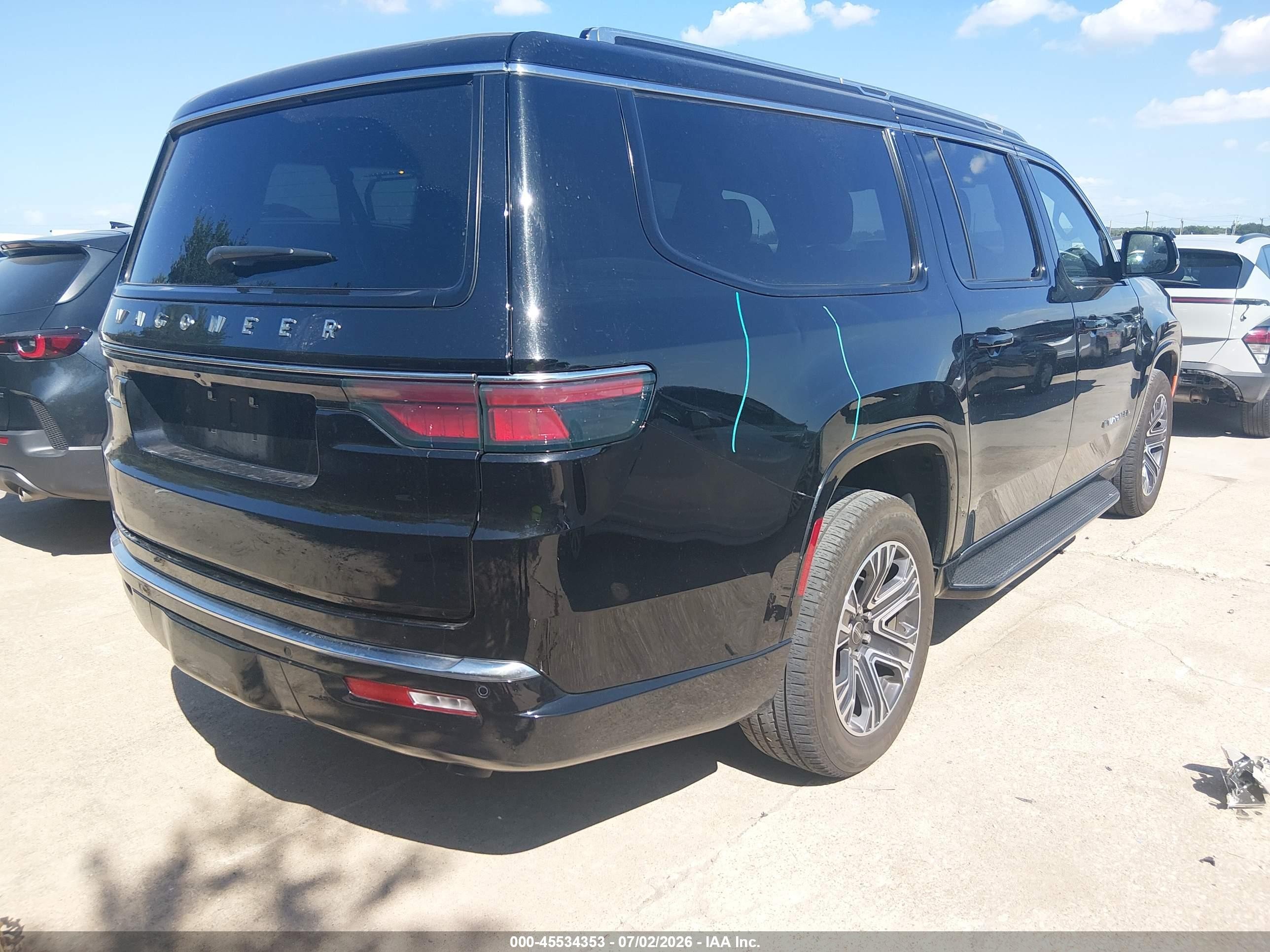 2025 Jeep Wagoneer VIN 1C4SJSBP1SS512353 IAAI salvage auction — Hail, Enterprise Vehicles Clear Only (Texas), sold $30,750 on 2026-07-09 (photo 4)