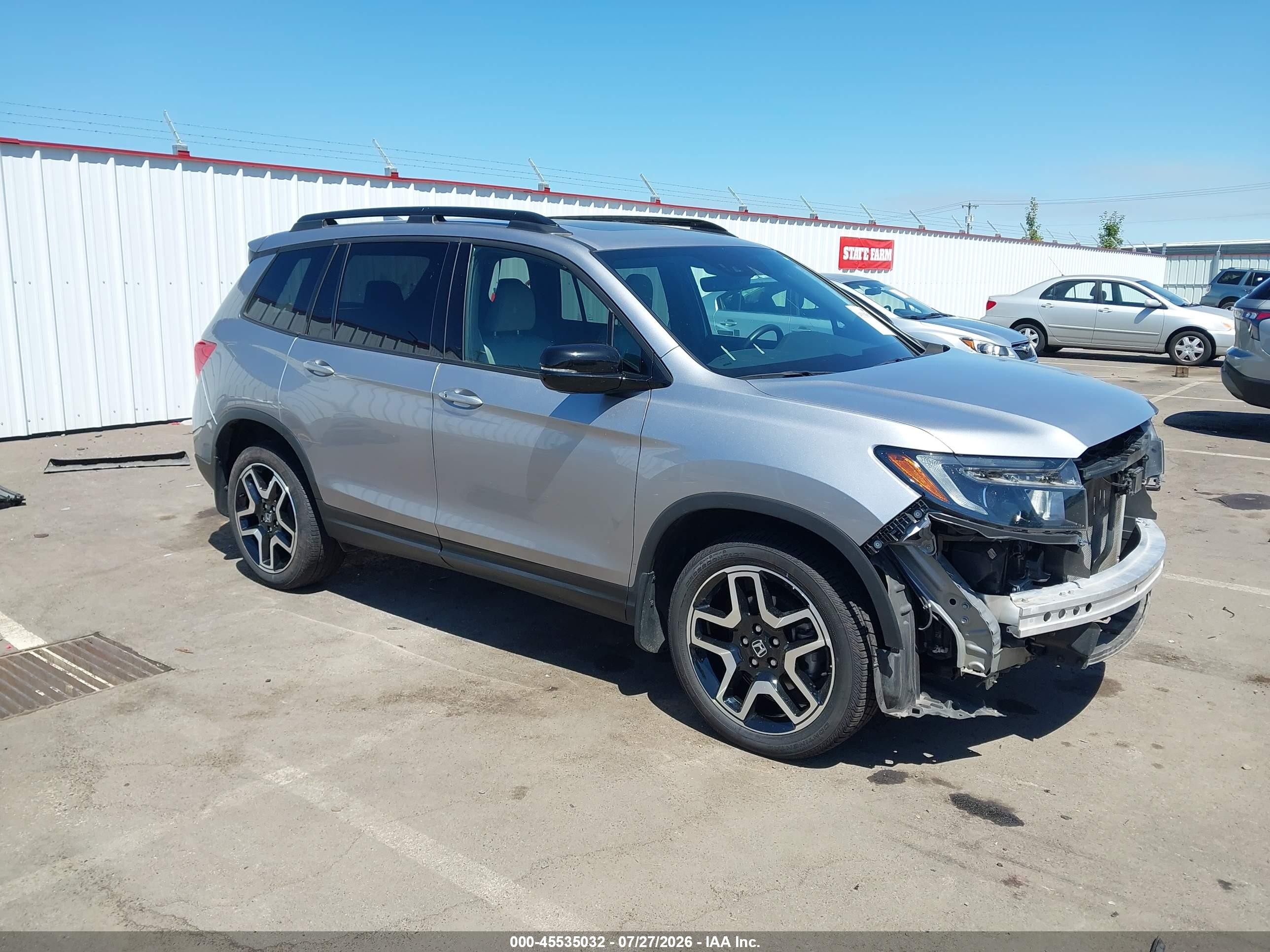 2023 Honda Passport VIN 5FNYF8H03PB035678 — IAAI salvage auction photo