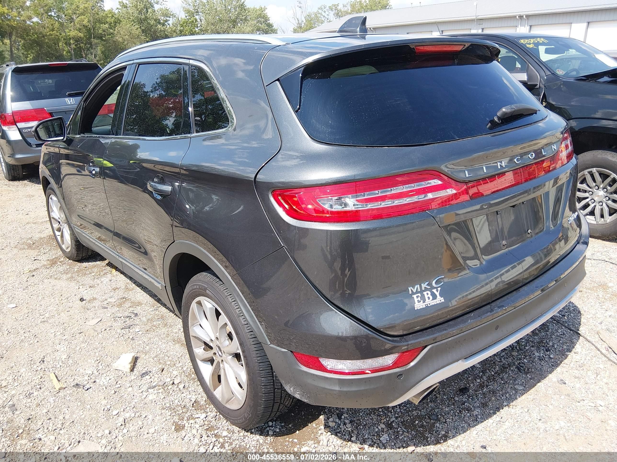 2018 Lincoln Mkc VIN 5LMCJ2D91JUL22714 IAAI salvage auction — Side, Clear (Indiana), sold $4,575 on 2026-09-18 (photo 3)