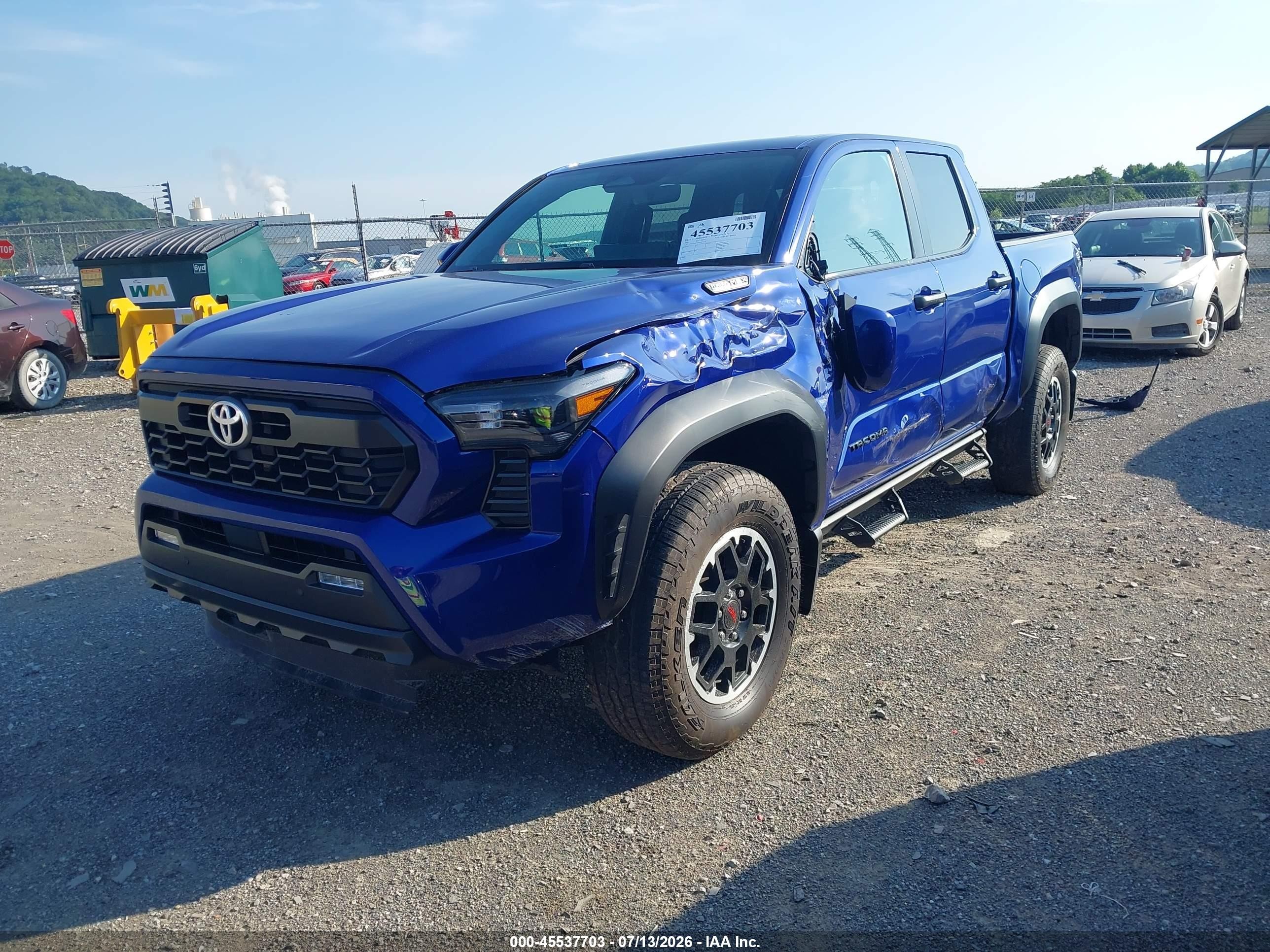 2025 Toyota Tacoma VIN 3TYLC5LN1ST033117 IAAI salvage auction — Front End, Salvage (Idaho), sold $28,500 on 2026-09-13 (photo 2)