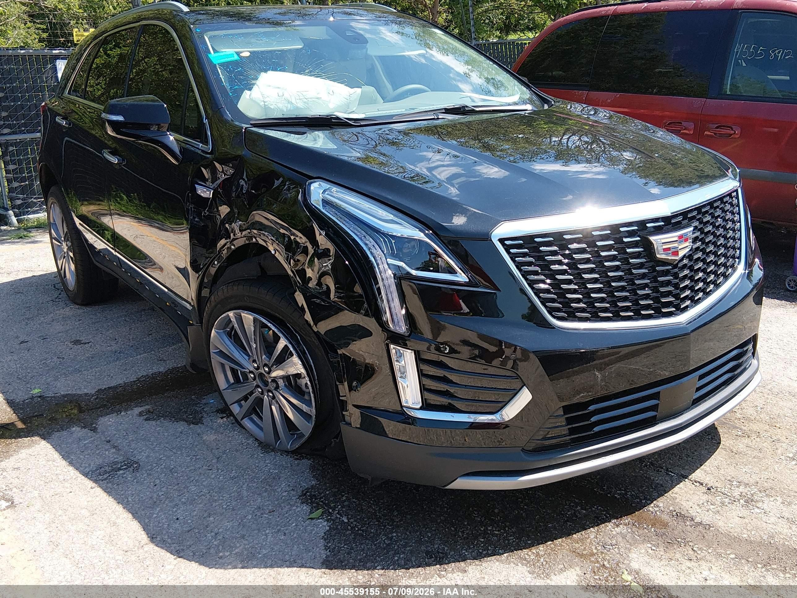 2025 Cadillac XT5 VIN 1GYKNDRS6SZ129018 — IAAI salvage auction photo
