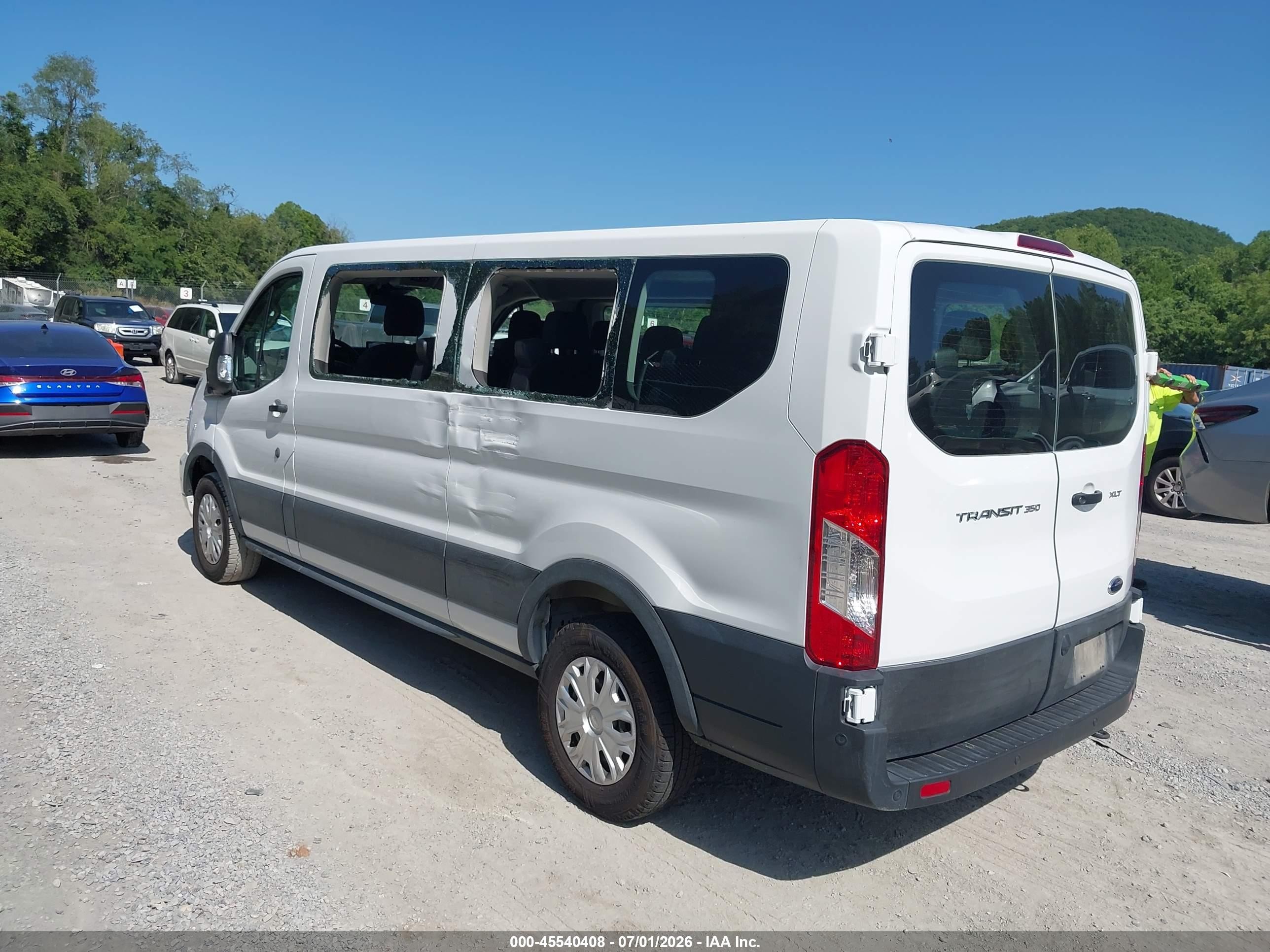 2025 Ford Transit-350 VIN 1FBAX2Y81SKA74254 IAAI salvage auction — Side, Enterprise Vehicles Clear Only (North Carolina), sold $32,100 on 2026-07-07 (photo 3)