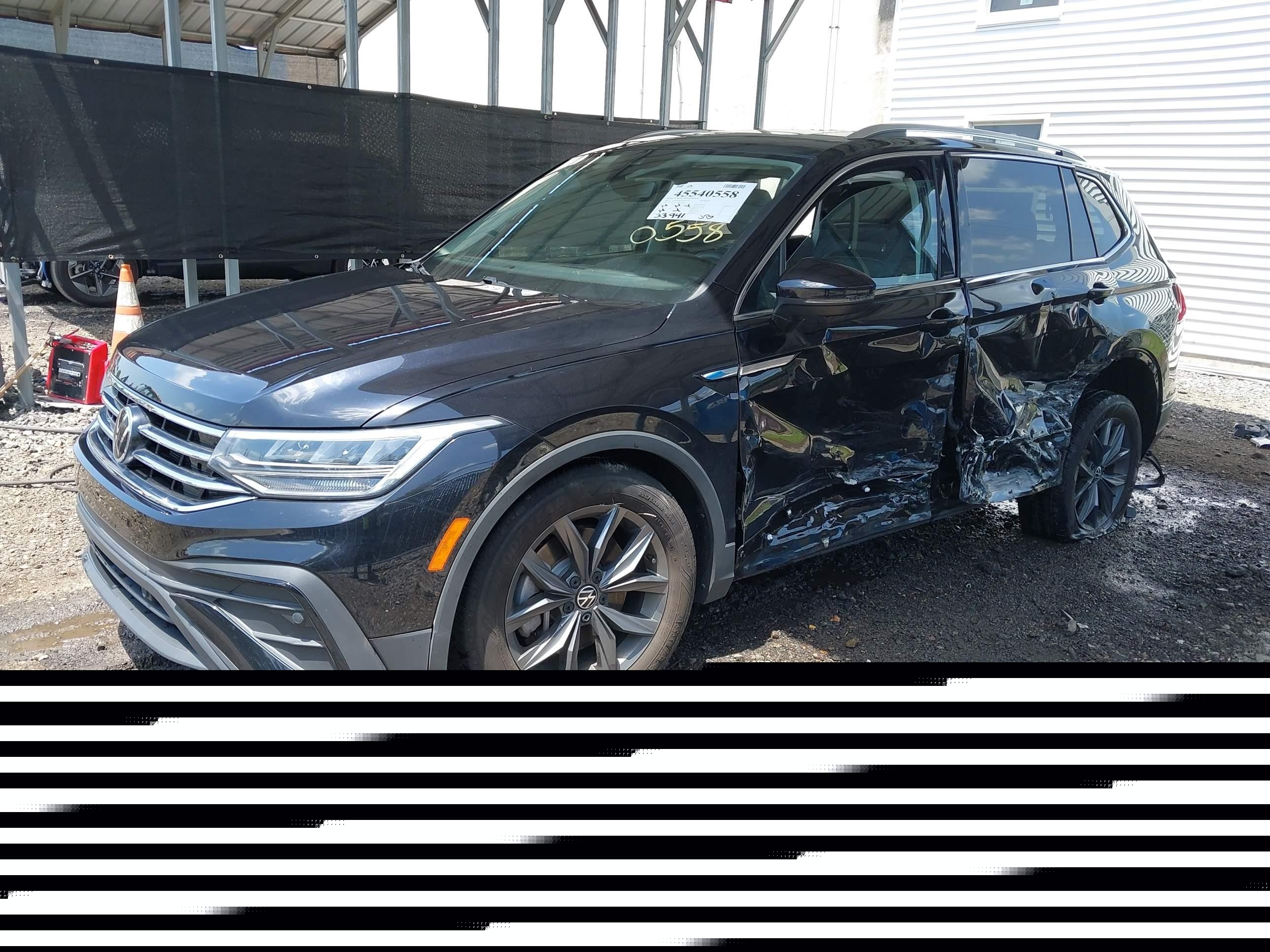 2022 Volkswagen Tiguan VIN 3VV2B7AX4NM074504 IAAI salvage auction — Side, Salvage (Delaware), sold $3,650 on 2026-09-13 (photo 2)