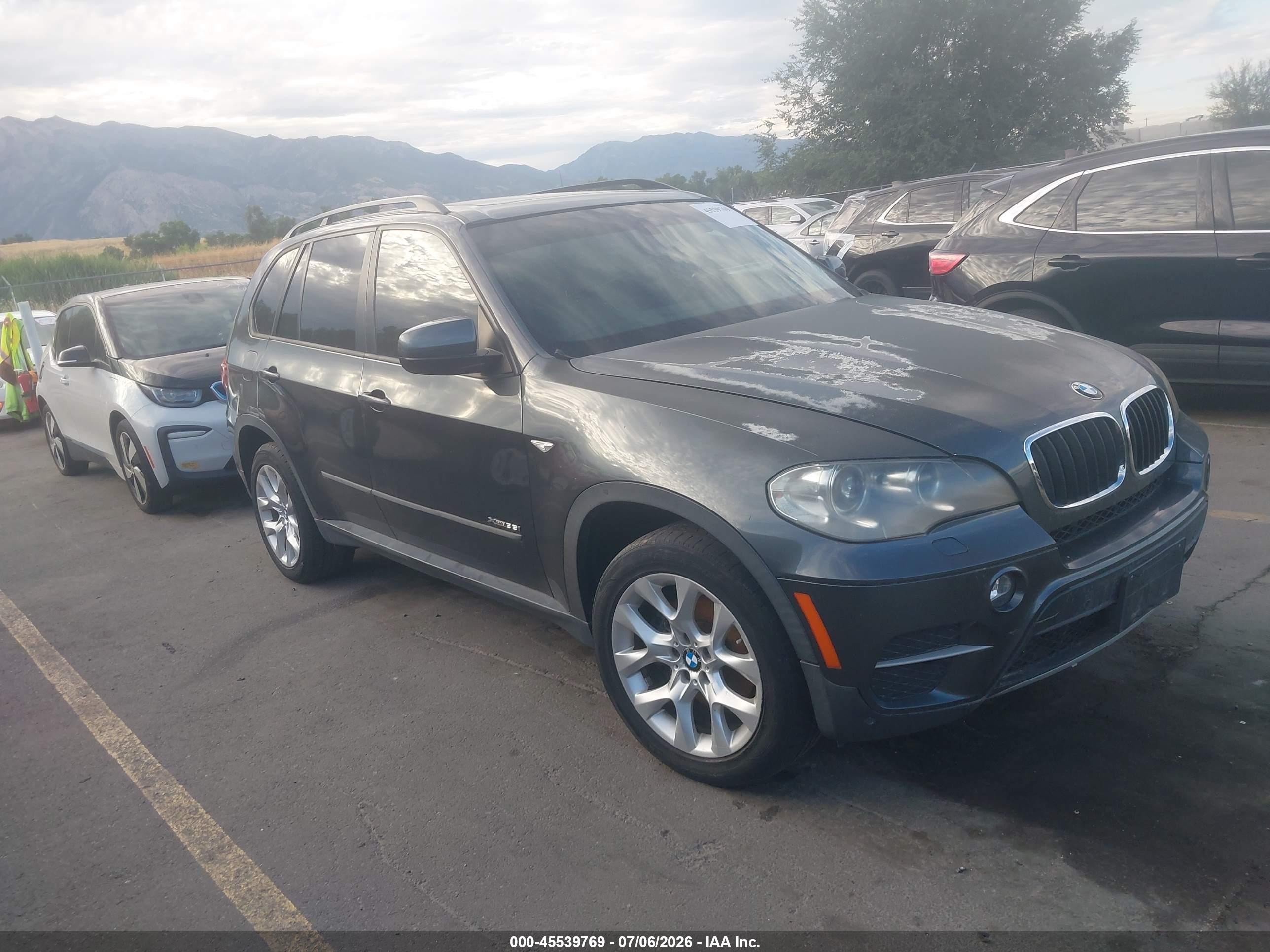 2012 BMW X5 VIN 5UXZV4C58CL754983 IAAI salvage auction — Normal Wear, Clear (Utah), sold $350 on 2026-07-09 (photo 1)