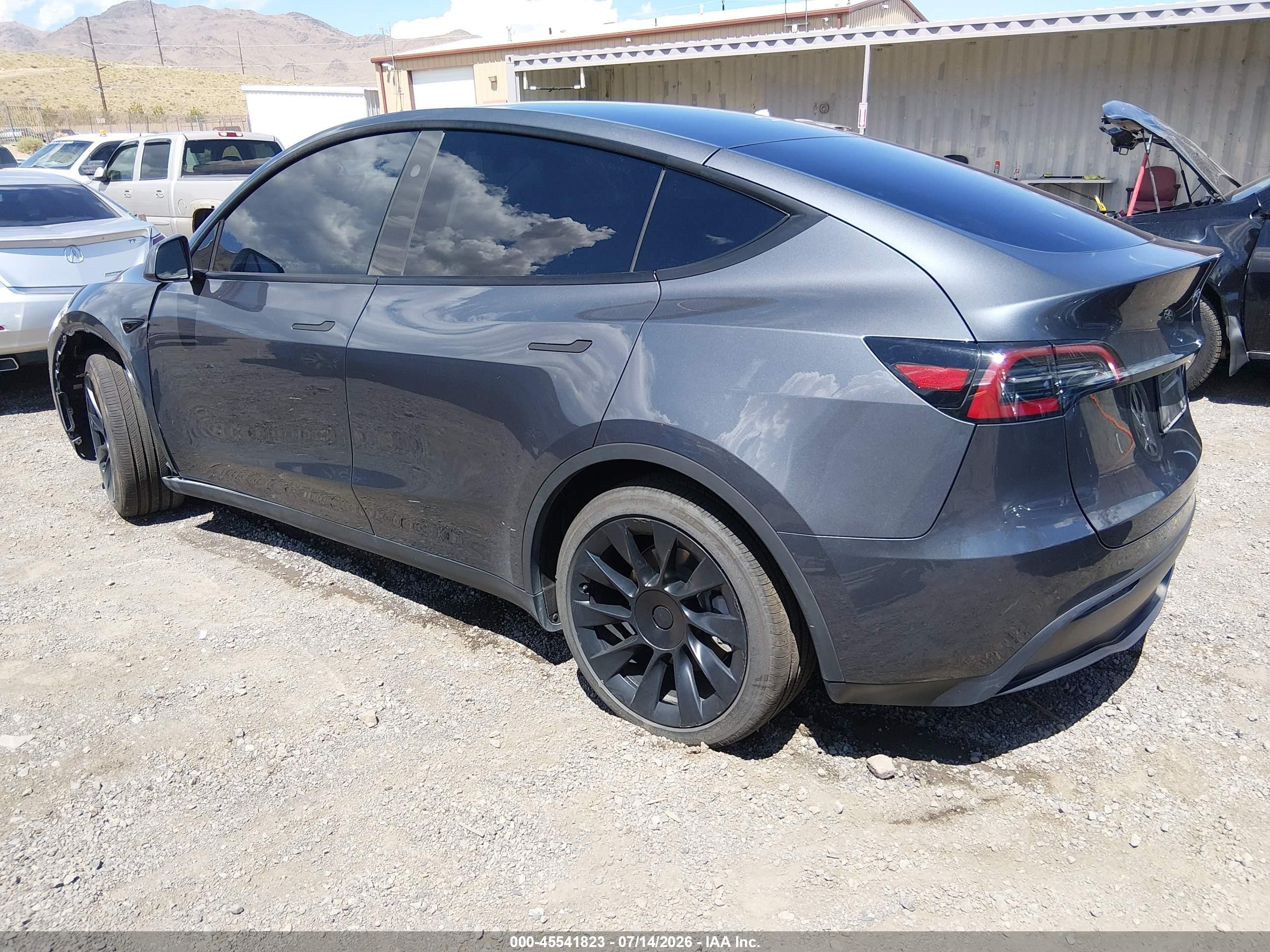 2023 Tesla Model Y VIN 7SAYGAEE3PF902486 IAAI salvage auction — Unknown, Salvage (Nevada), sold $12,200 on 2026-09-19 (photo 3)