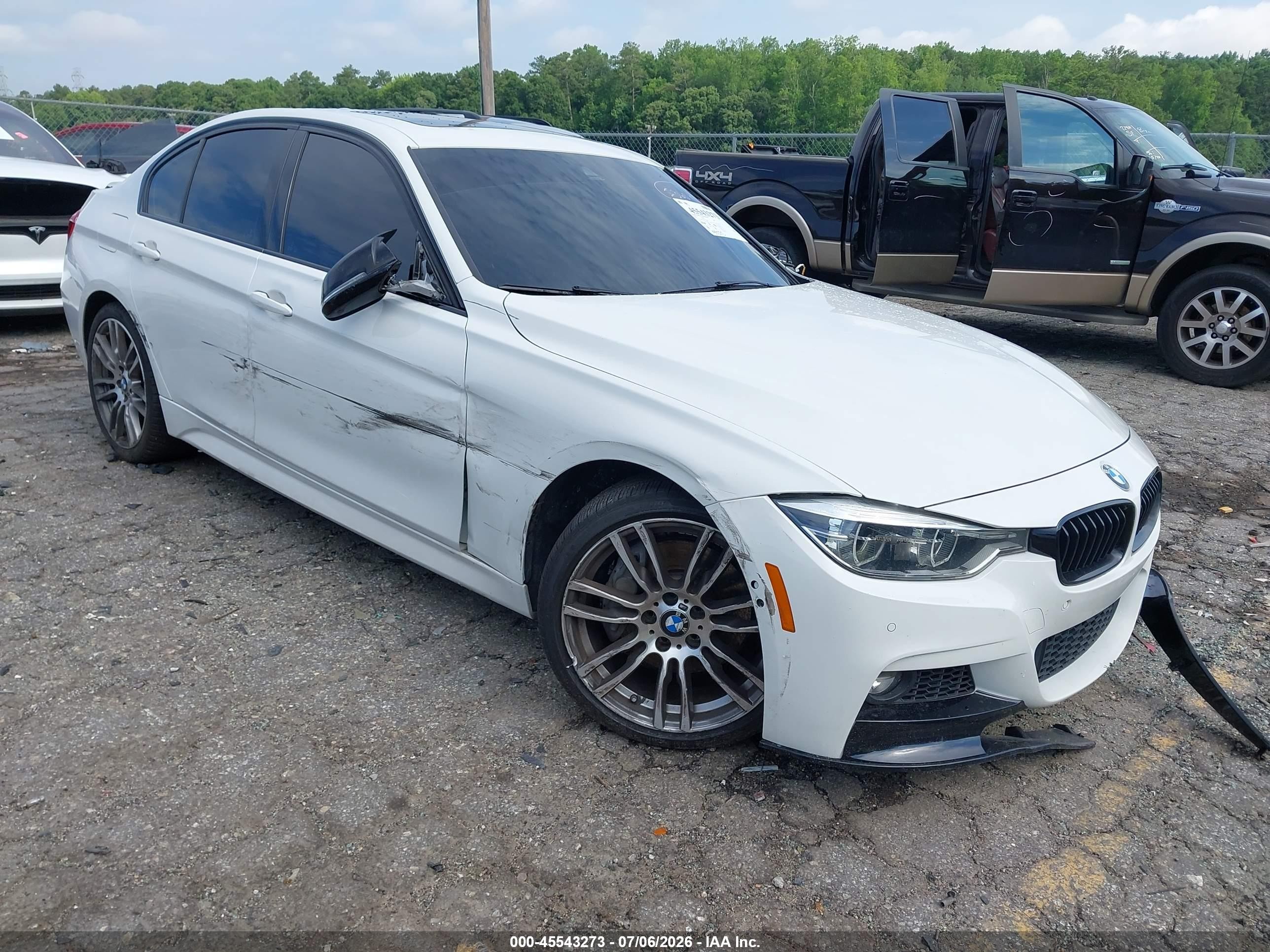 2018 BMW 3 Series VIN WBA8B3C5XJK777780 — IAAI salvage auction photo