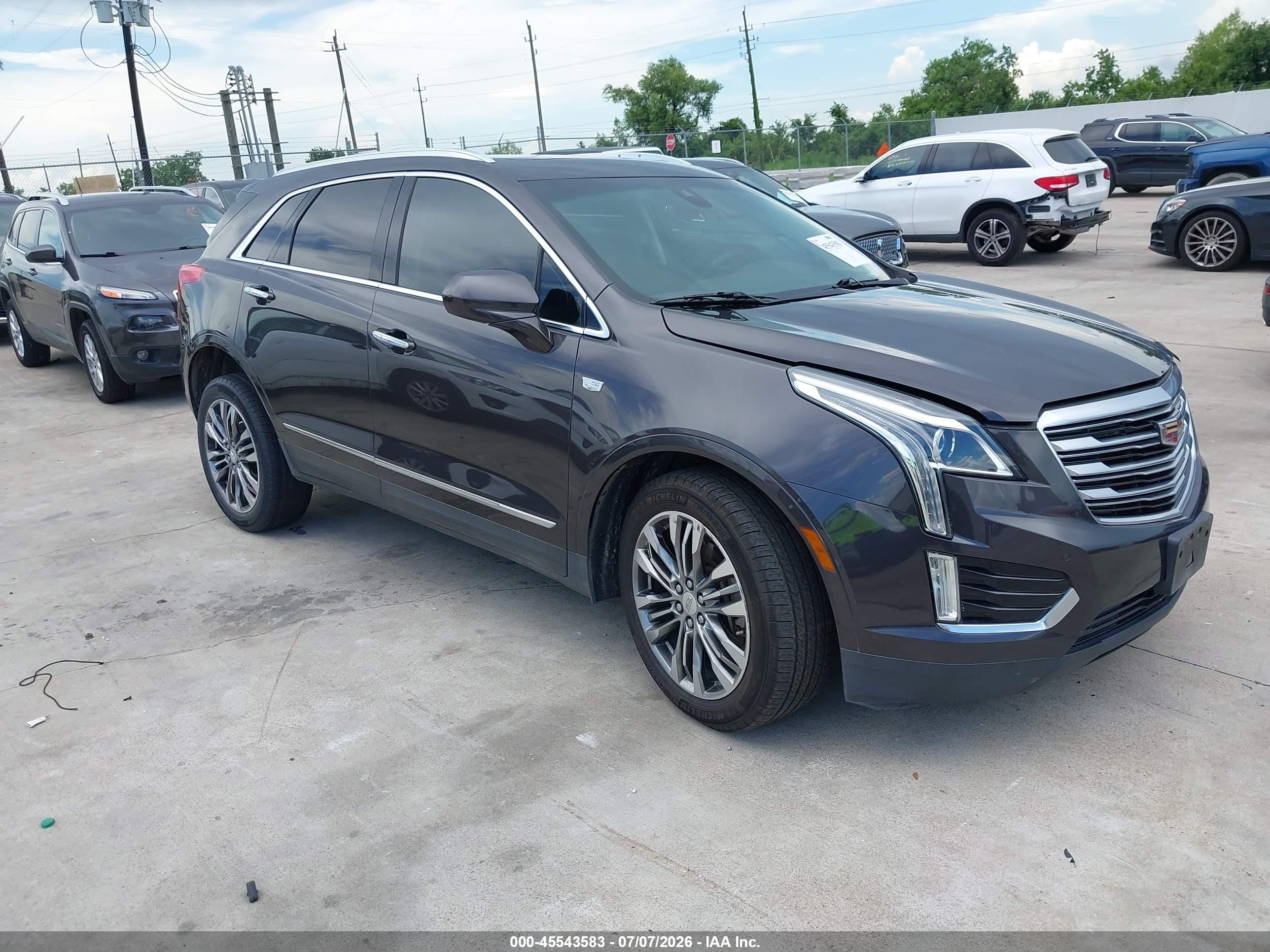 2019 Cadillac XT5 VIN 1GYKNCRS1KZ115604 IAAI salvage auction — Front End, Original (Texas), sold $3,050 on 2026-09-13 (photo 1)