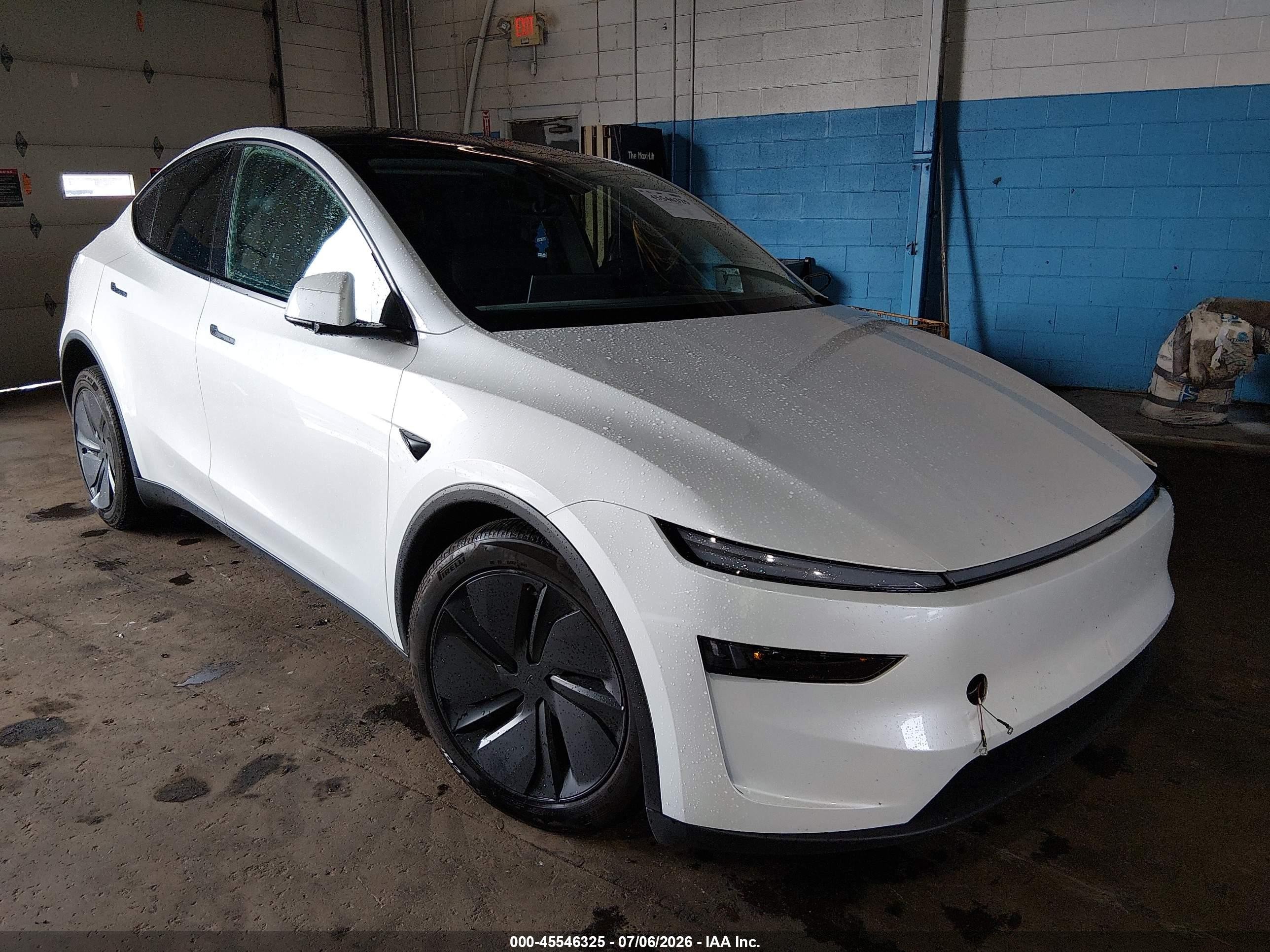 2026 Tesla Model Y VIN 7SAYGDED6TA489401 — IAAI salvage auction photo