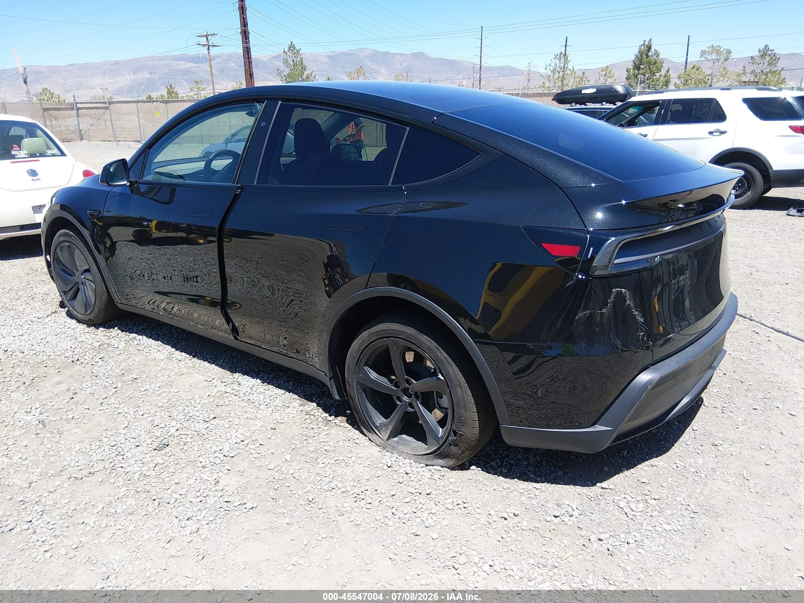 2026 Tesla Model y VIN 7SAYGDEE6TF426939 IAAI salvage auction — Rear End, Salvage (Nevada), sold $26,750 on 2026-09-11 (photo 3)