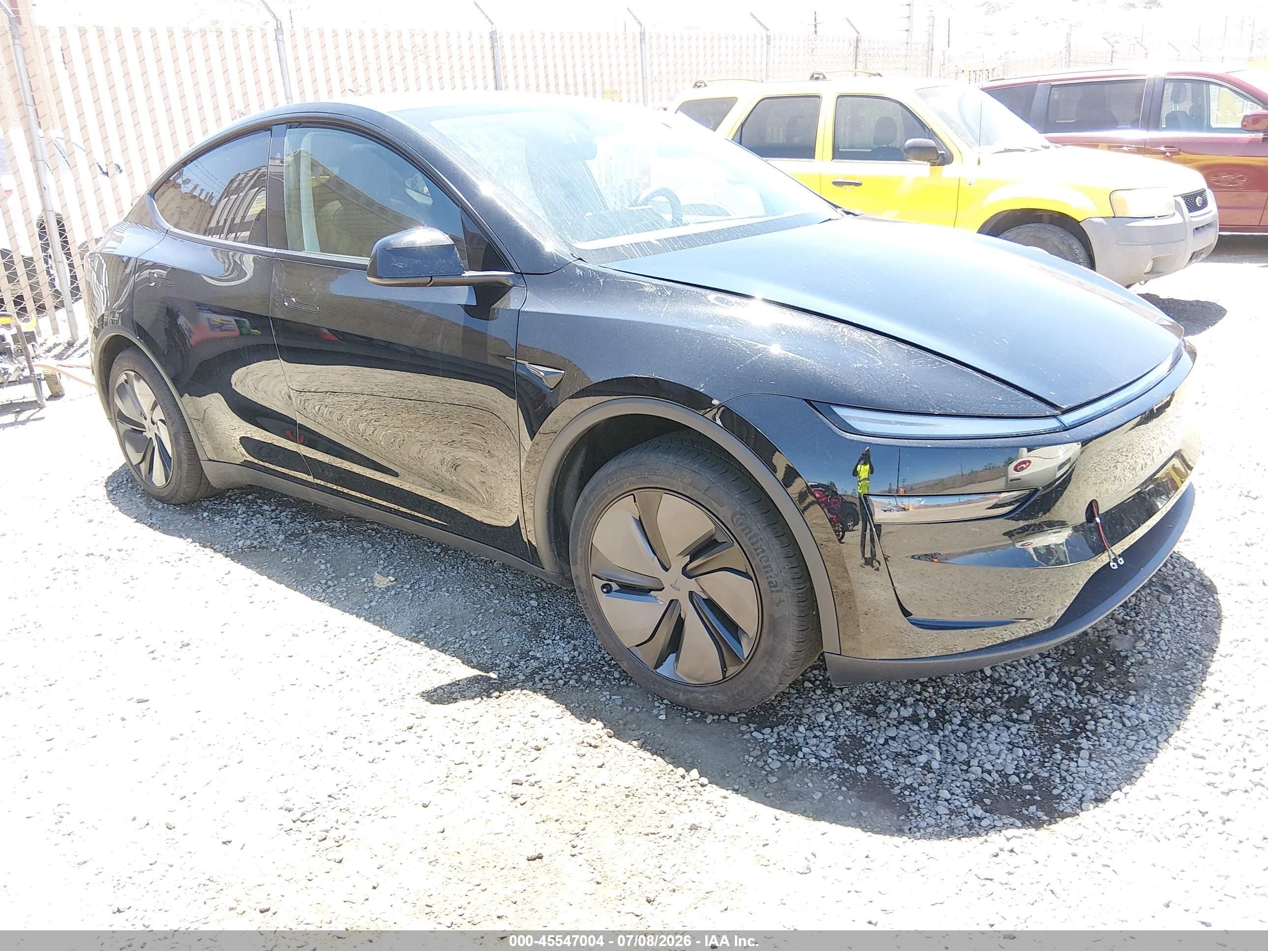 2026 Tesla Model y VIN 7SAYGDEE6TF426939 IAAI salvage auction — Rear End, Salvage (Nevada), sold $26,750 on 2026-09-11 (photo 1)