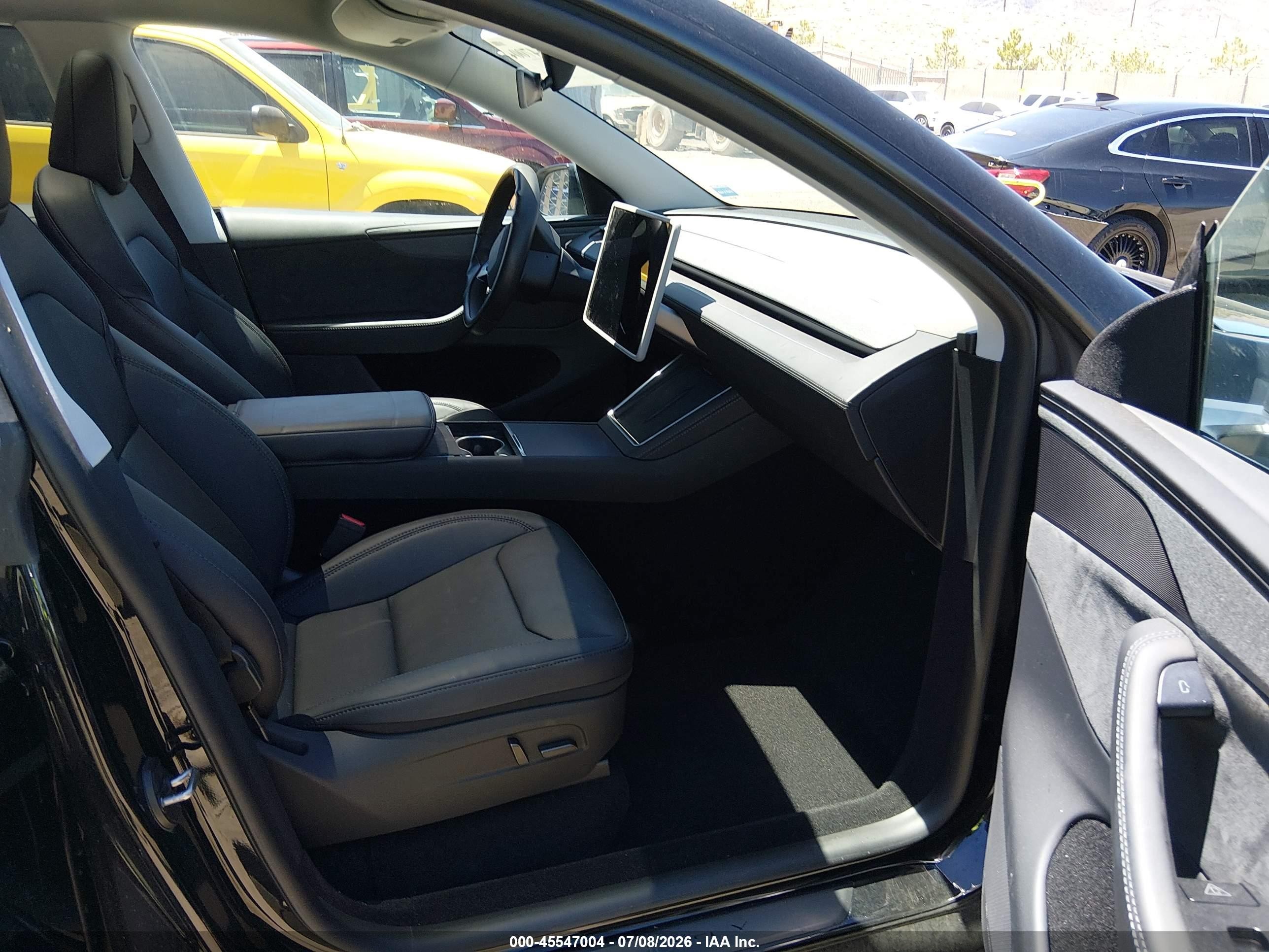2026 Tesla Model y VIN 7SAYGDEE6TF426939 IAAI salvage auction — Rear End, Salvage (Nevada), sold $26,750 on 2026-09-11 (photo 5)