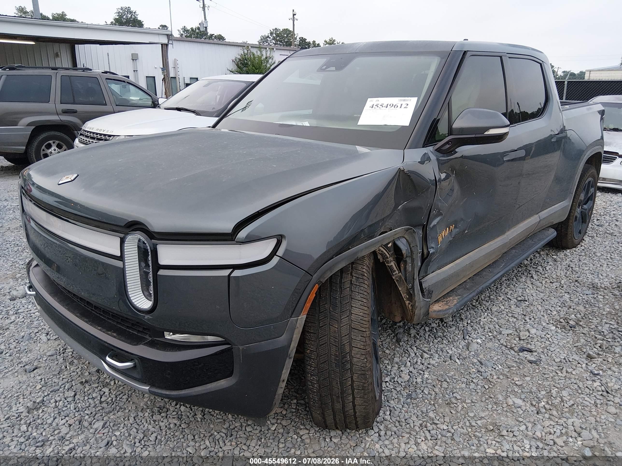 2023 Rivian R1T VIN 7FCTGAAA3PN018814 IAAI salvage auction — Side, Salvage (Georgia), sold $12,600 on 2026-09-25 (photo 2)