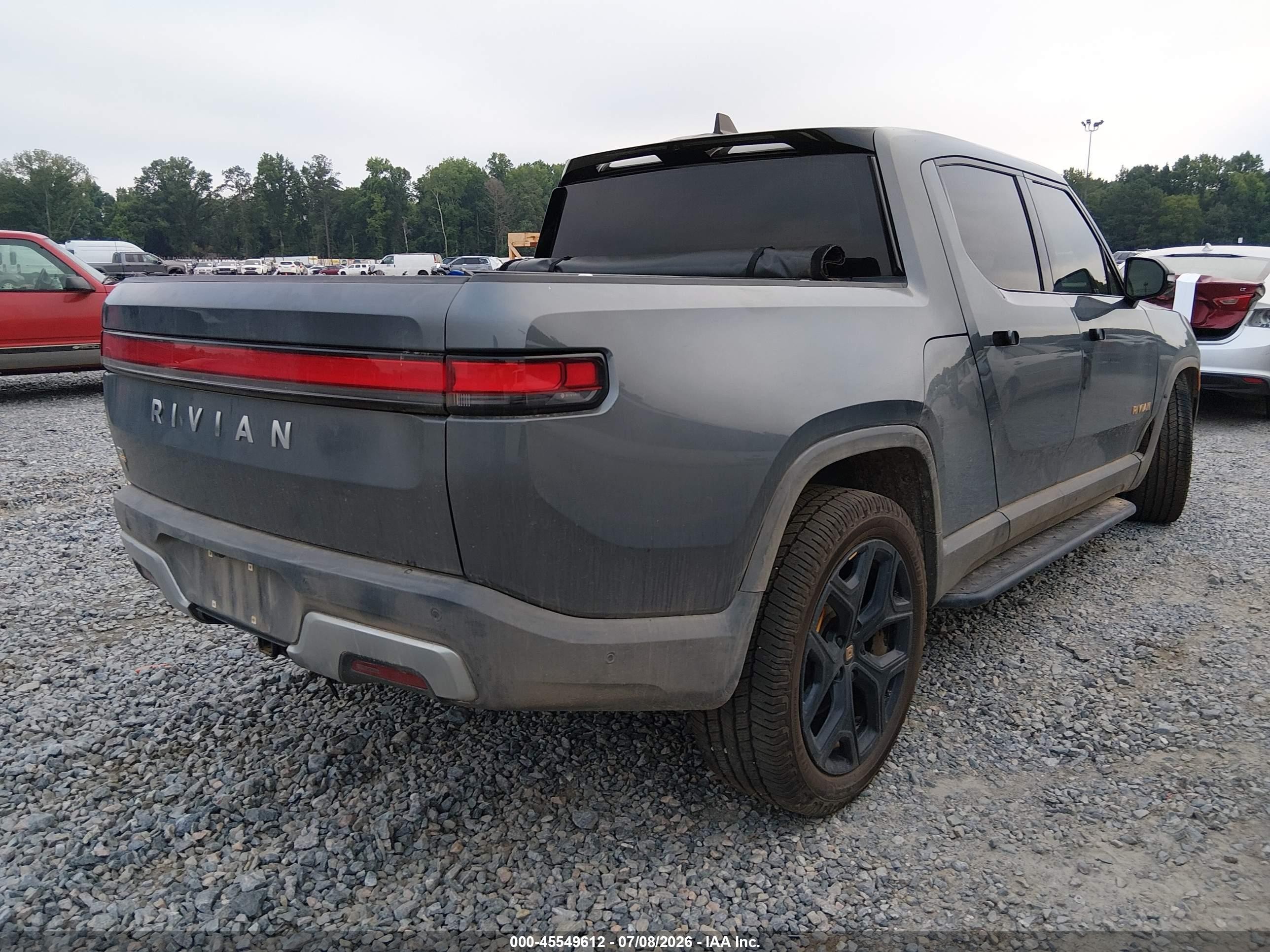 2023 Rivian R1T VIN 7FCTGAAA3PN018814 IAAI salvage auction — Side, Salvage (Georgia), sold $12,600 on 2026-09-25 (photo 4)