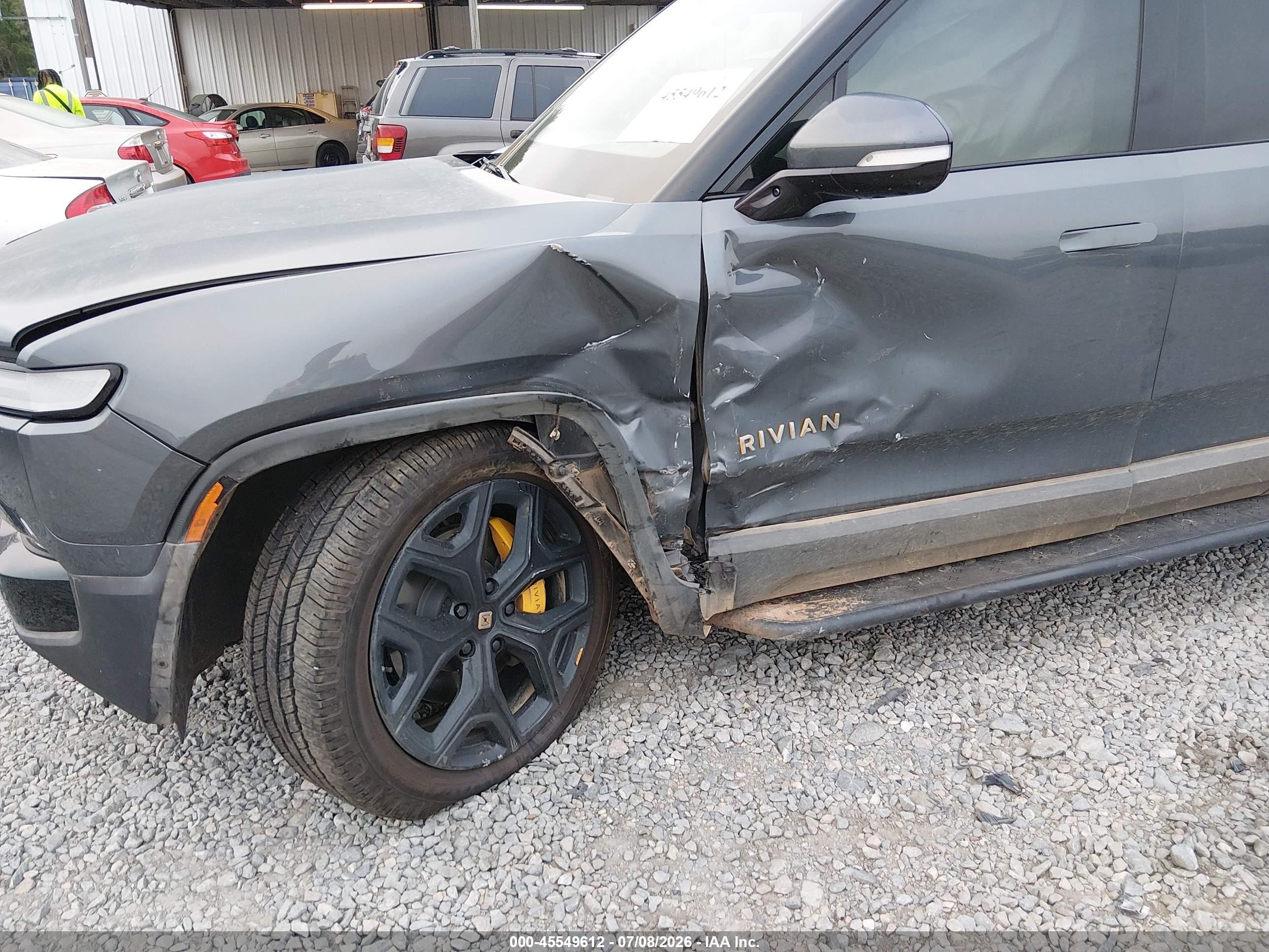 2023 Rivian R1T VIN 7FCTGAAA3PN018814 IAAI salvage auction — Side, Salvage (Georgia), sold $12,600 on 2026-09-25 (photo 6)