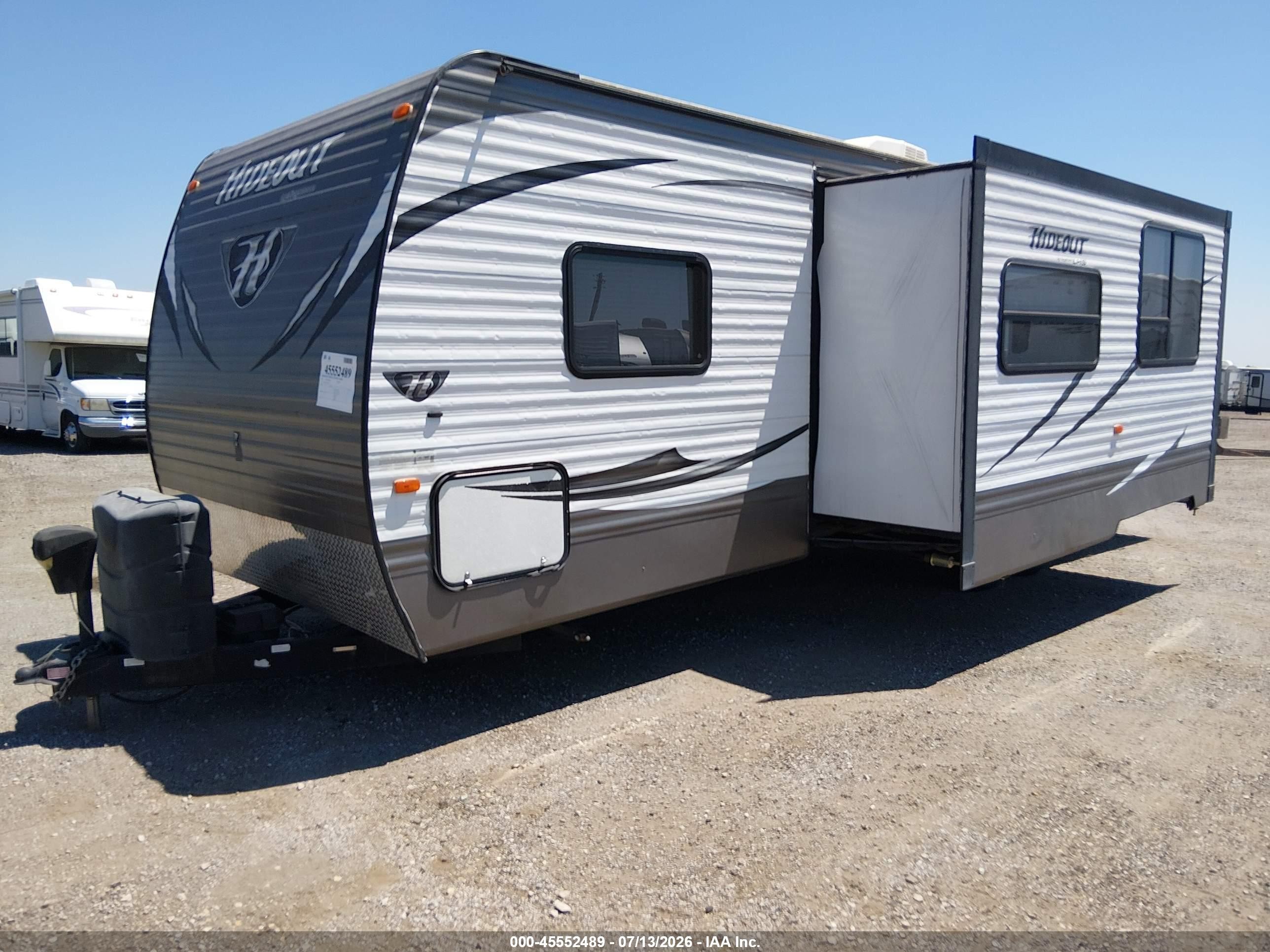 2015 Keystone Hideout VIN 4YDT28027F7201334 IAAI salvage auction — Hail, Regular Certificate (Iowa), sold $2,700 on 2026-09-13 (photo 2)