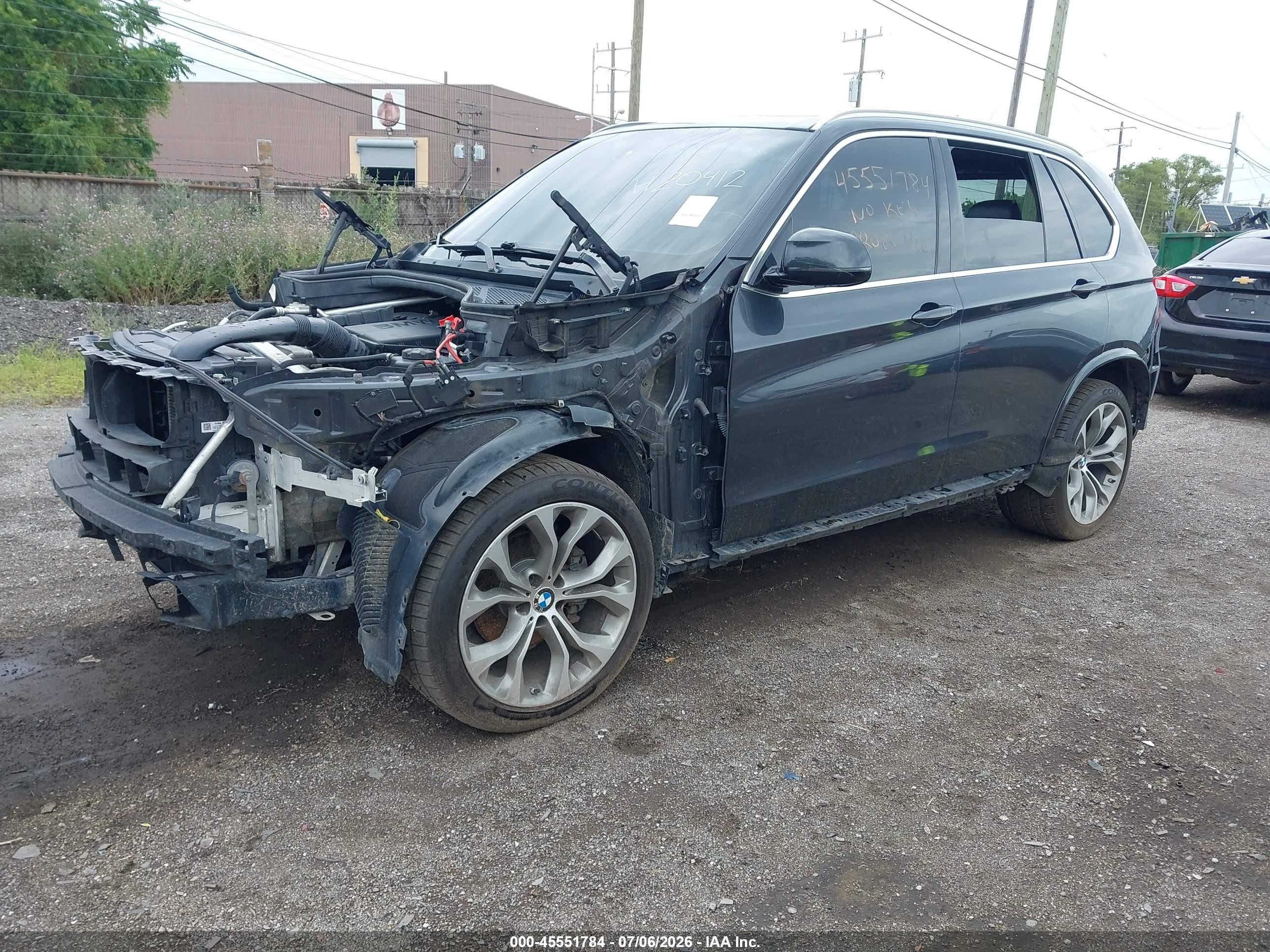 2014 BMW X5 VIN 5UXKR0C57E0H20412 IAAI salvage auction — Theft, Clear (Michigan), sold $700 on 2026-09-11 (photo 2)