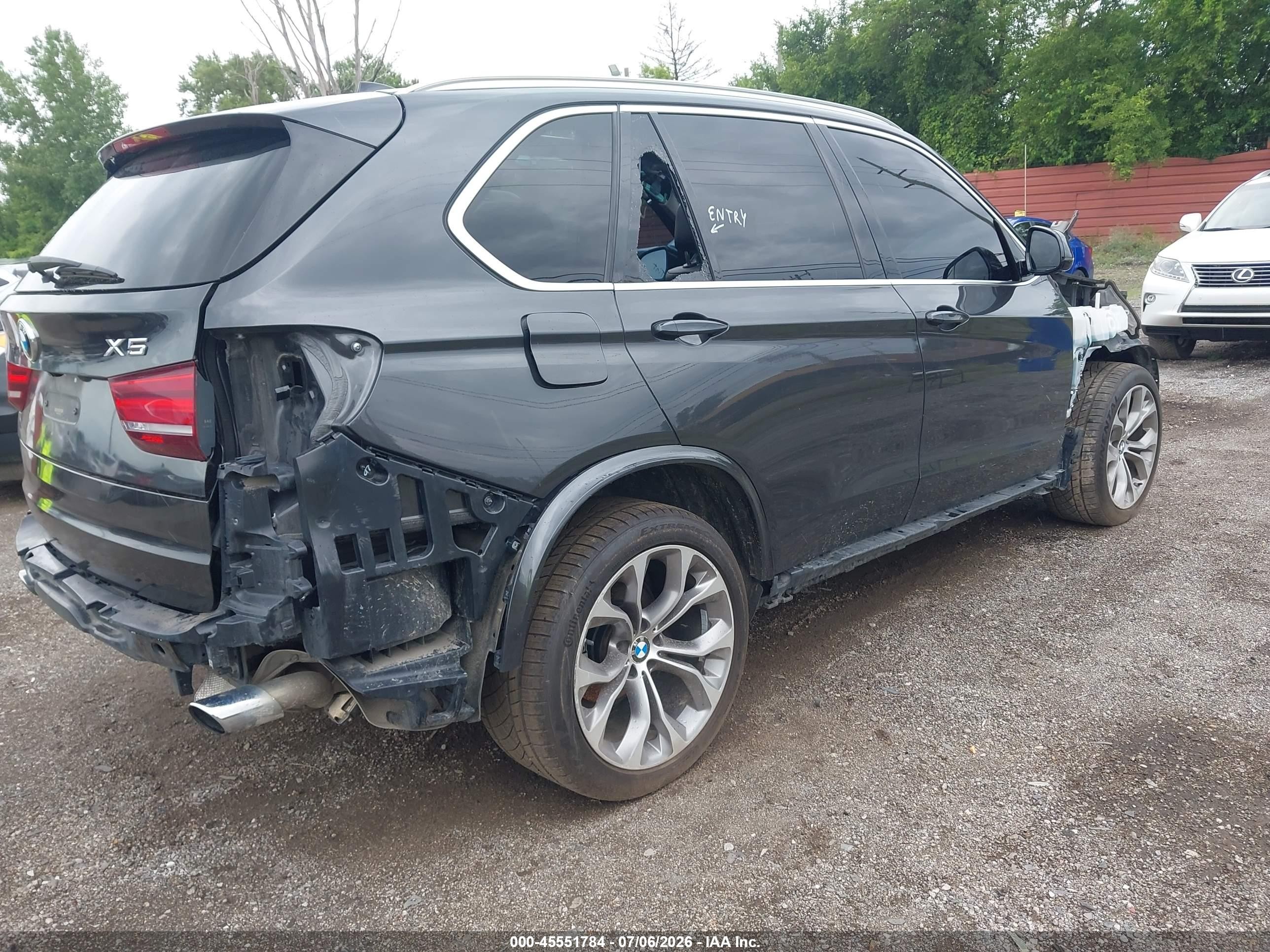 2014 BMW X5 VIN 5UXKR0C57E0H20412 IAAI salvage auction — Theft, Clear (Michigan), sold $700 on 2026-09-11 (photo 4)