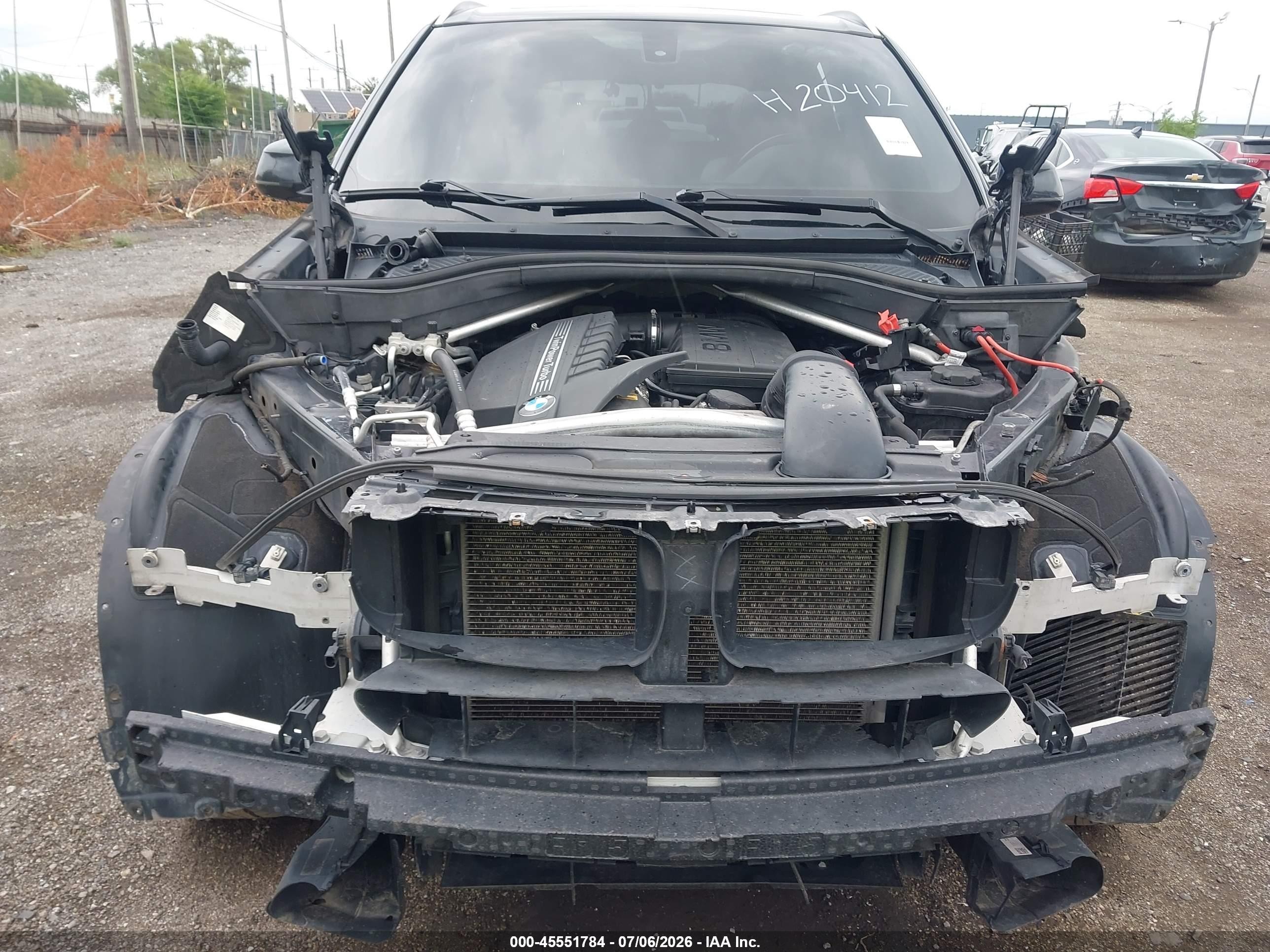 2014 BMW X5 VIN 5UXKR0C57E0H20412 IAAI salvage auction — Theft, Clear (Michigan), sold $700 on 2026-09-11 (photo 6)