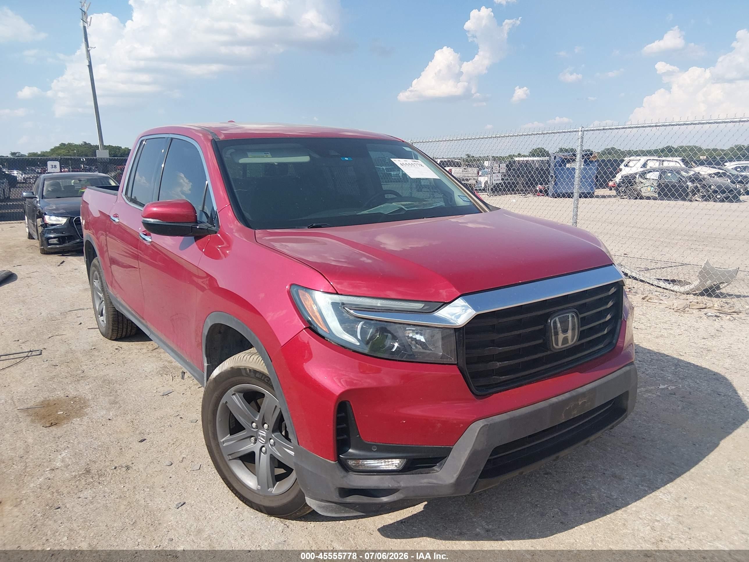2023 Honda Ridgeline VIN 5FPYK3F74PB019950 — IAAI salvage auction photo