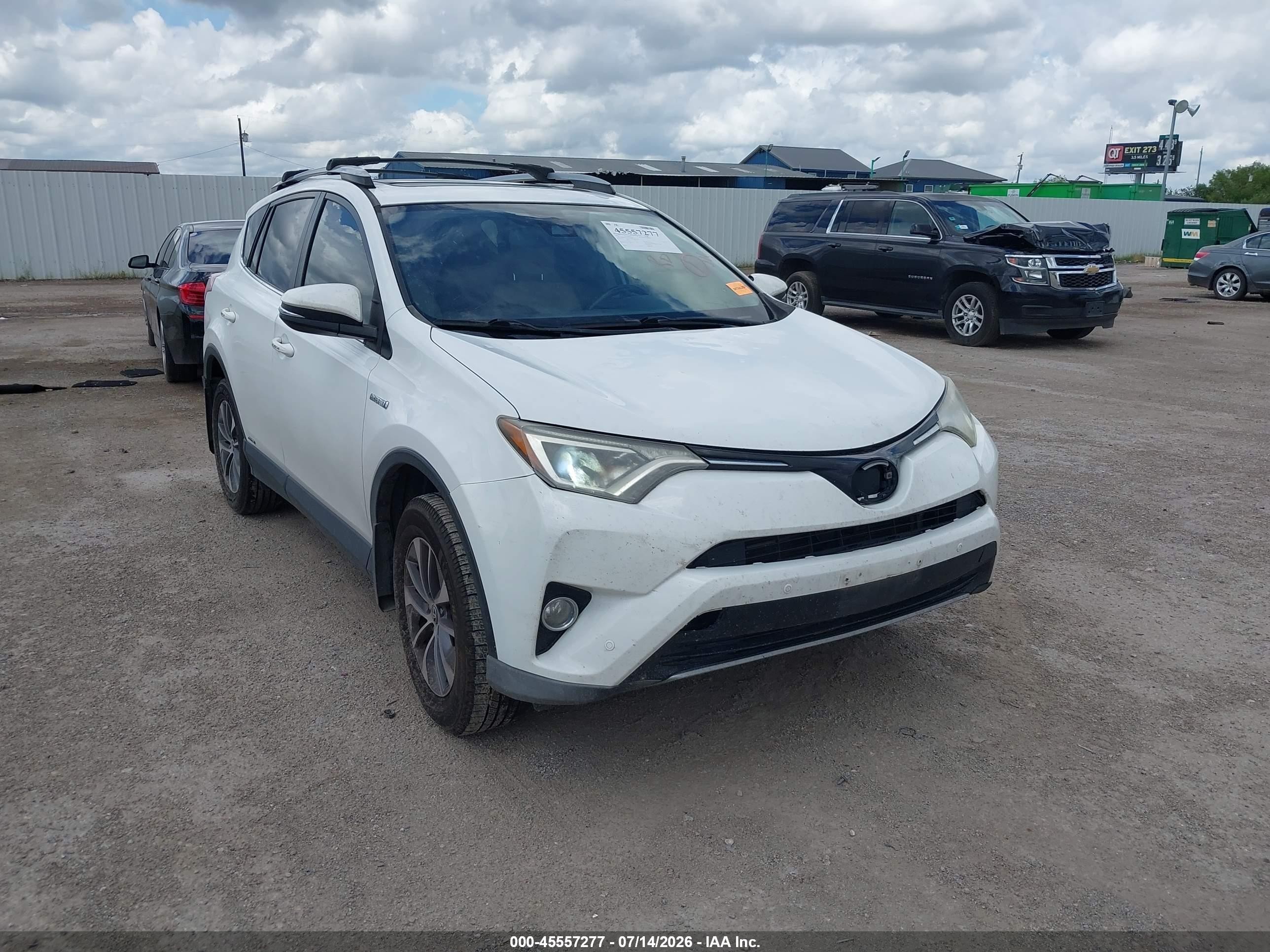 2017 Toyota RAV4 Hybrid VIN JTMRJREV3HD129299 — IAAI salvage auction photo