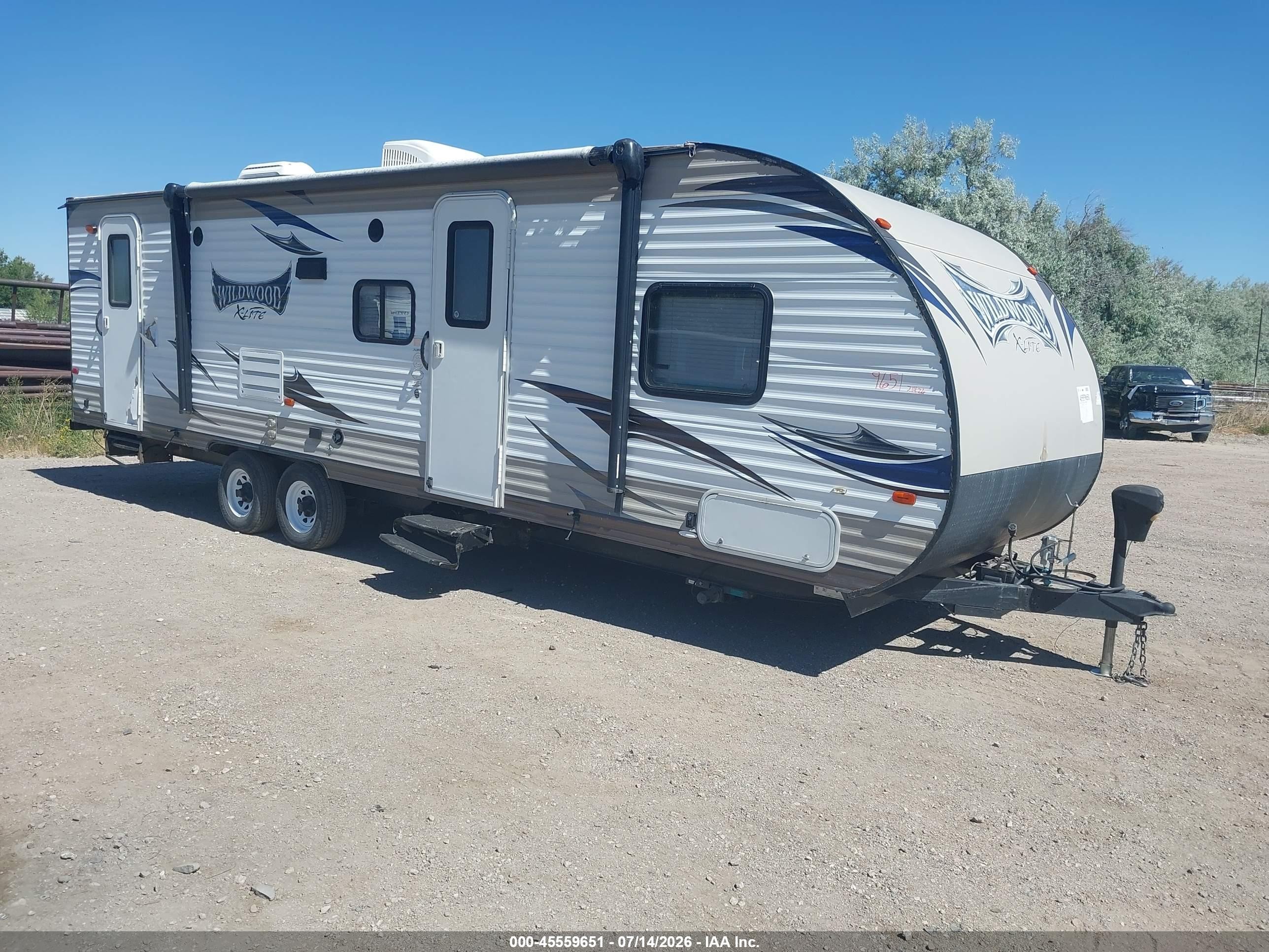 2015 Wildwood X-Lite VIN 4X4TWDB23F7349181 IAAI salvage auction — Side, Clear (Wyoming), sold $150 on 2026-09-16 (photo 1)