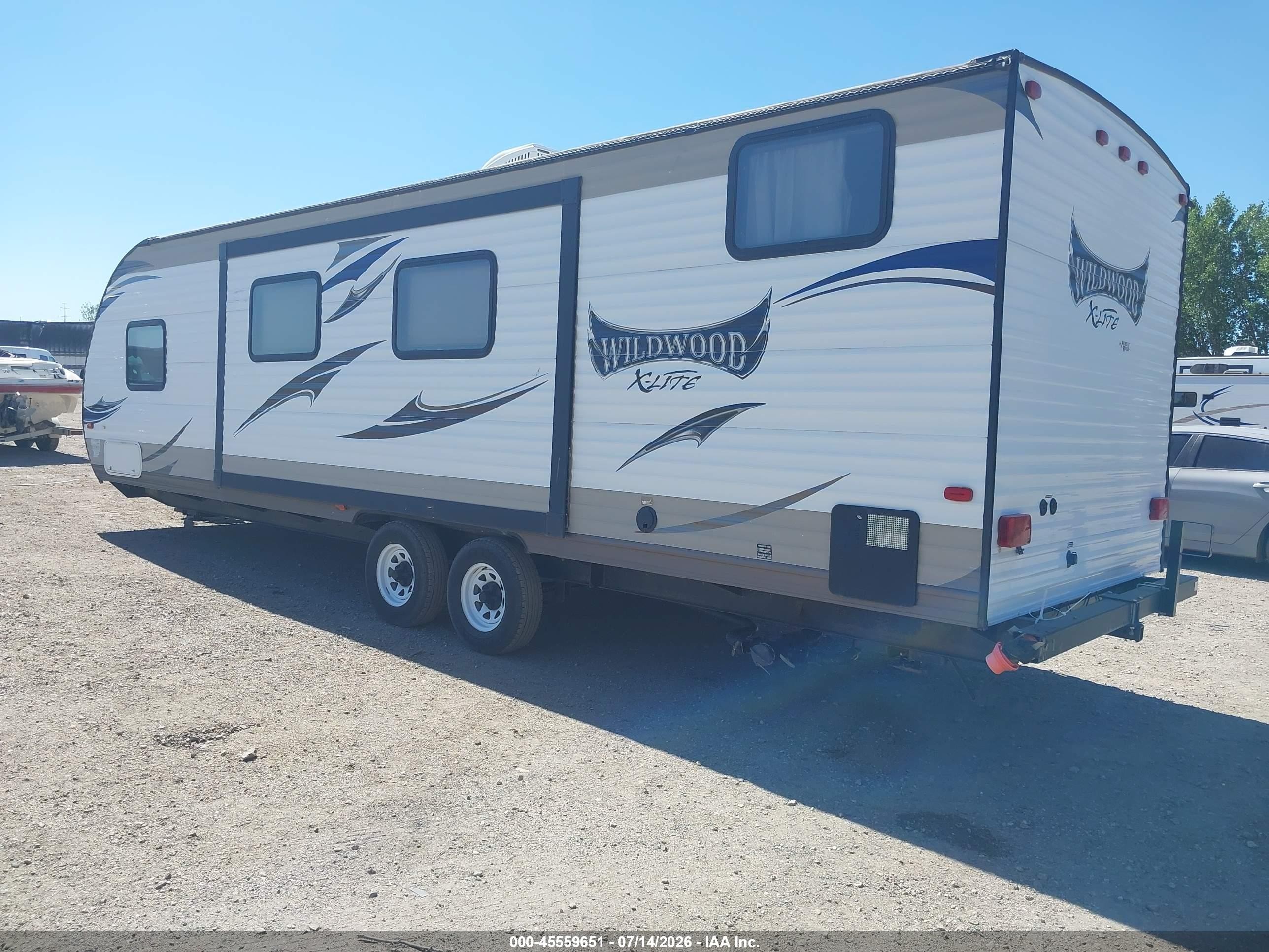 2015 Wildwood X-Lite VIN 4X4TWDB23F7349181 IAAI salvage auction — Side, Clear (Wyoming), sold $150 on 2026-09-16 (photo 3)