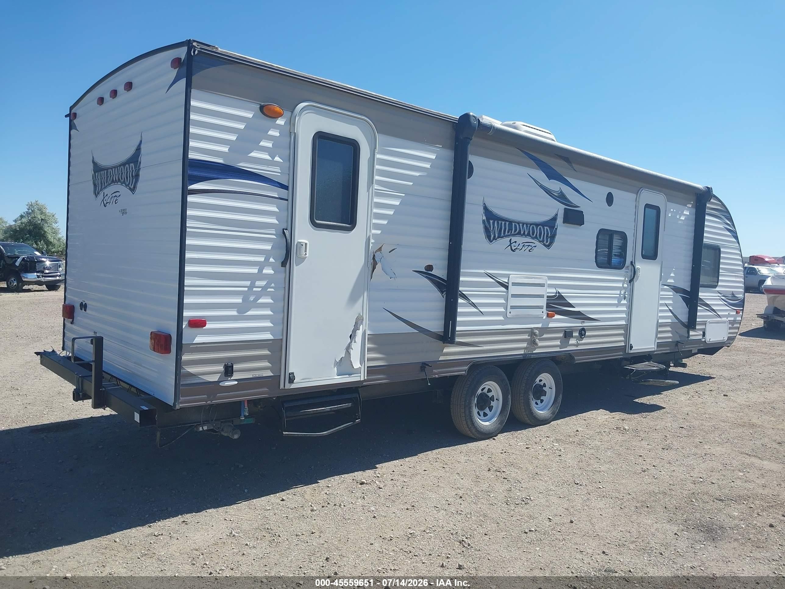 2015 Wildwood X-Lite VIN 4X4TWDB23F7349181 IAAI salvage auction — Side, Clear (Wyoming), sold $150 on 2026-09-16 (photo 4)