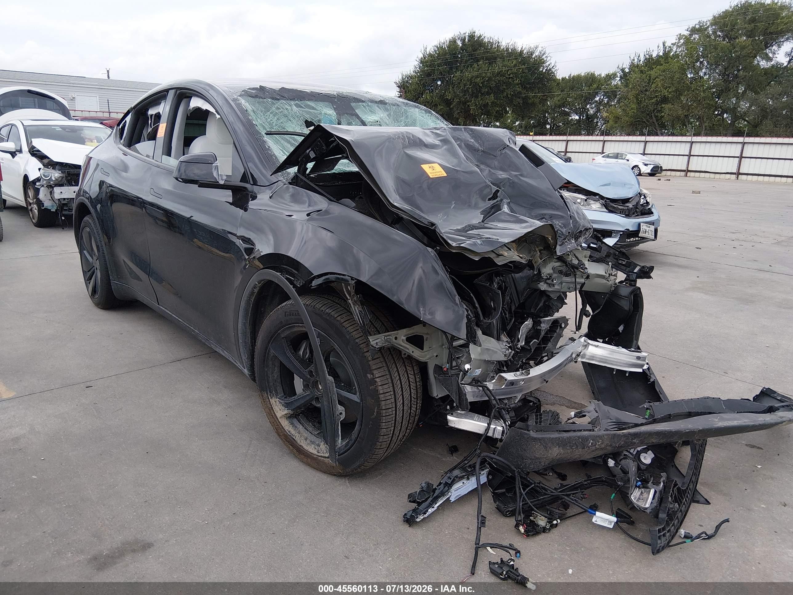 2026 Tesla Model y VIN 7SAYGDEDXTA611175 IAAI salvage auction — Front End, Non-Repairable (Texas), sold $7,100 on 2026-09-25 (photo 1)
