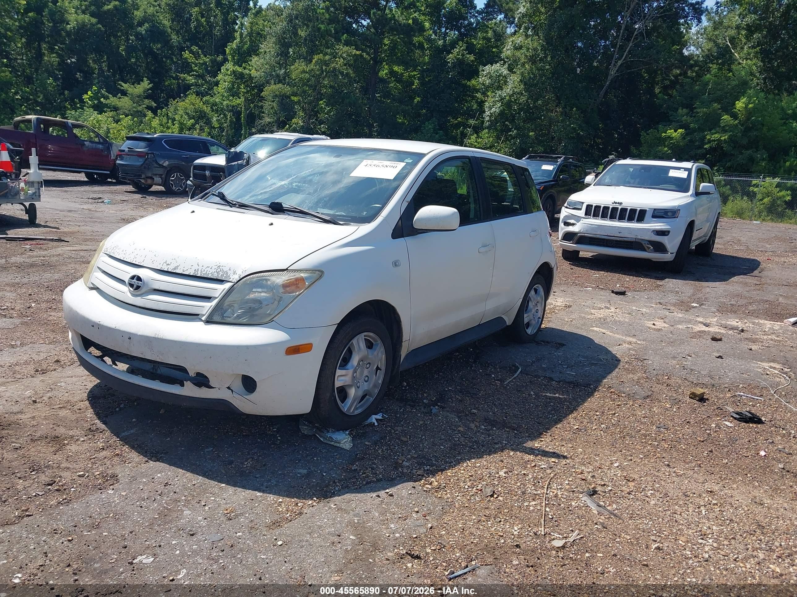 2004 Scion Xa VIN JTKKT624940074521 IAAI salvage auction — Side, Salvage (Mississippi), sold $425 on 2026-08-31 (photo 2)