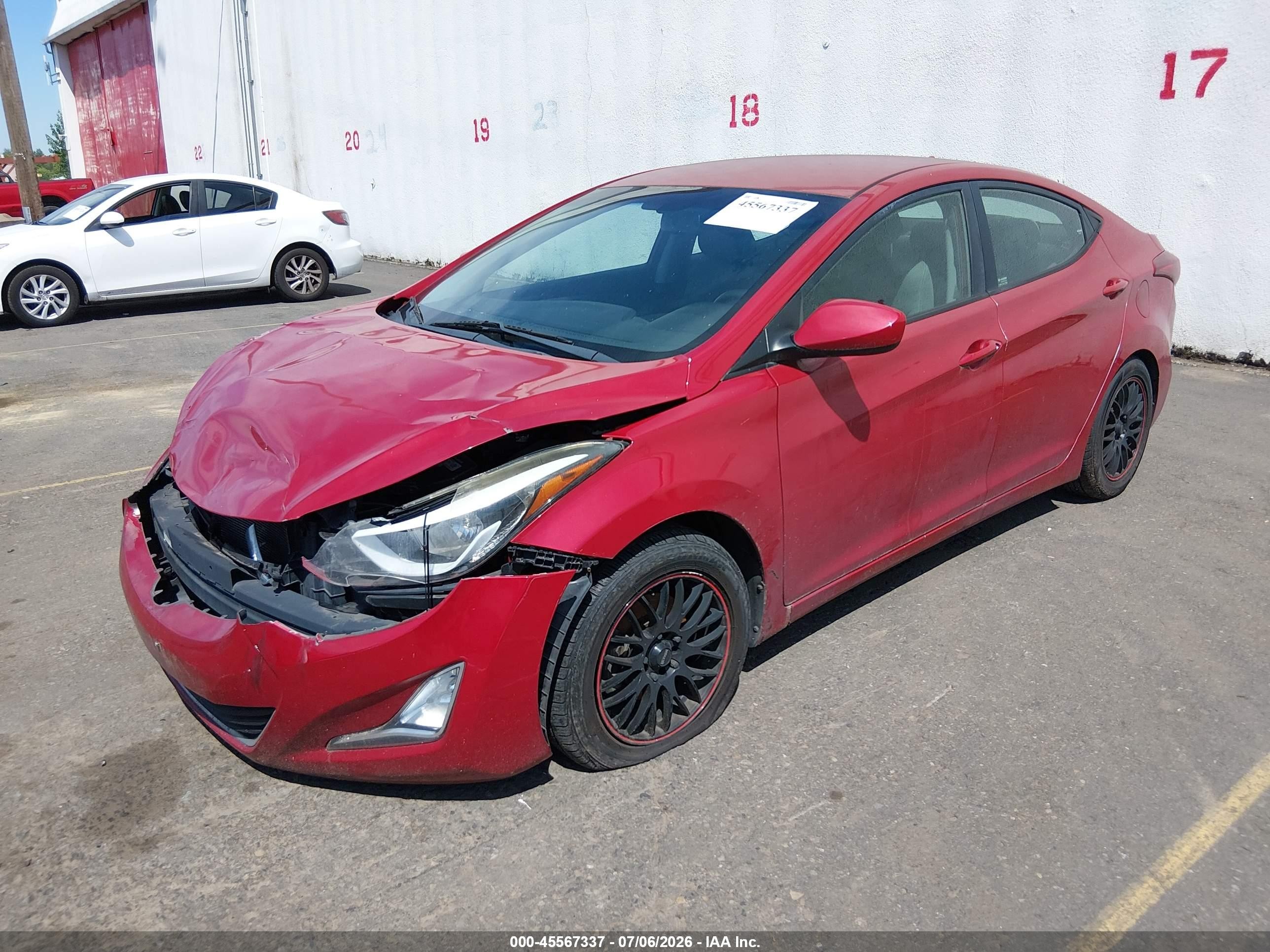 2014 Hyundai Elantra VIN KMHDH4AE9EU158067 IAAI salvage auction — Normal Wear, Rebuilt (Washington), sold $100 on 2026-07-09 (photo 2)