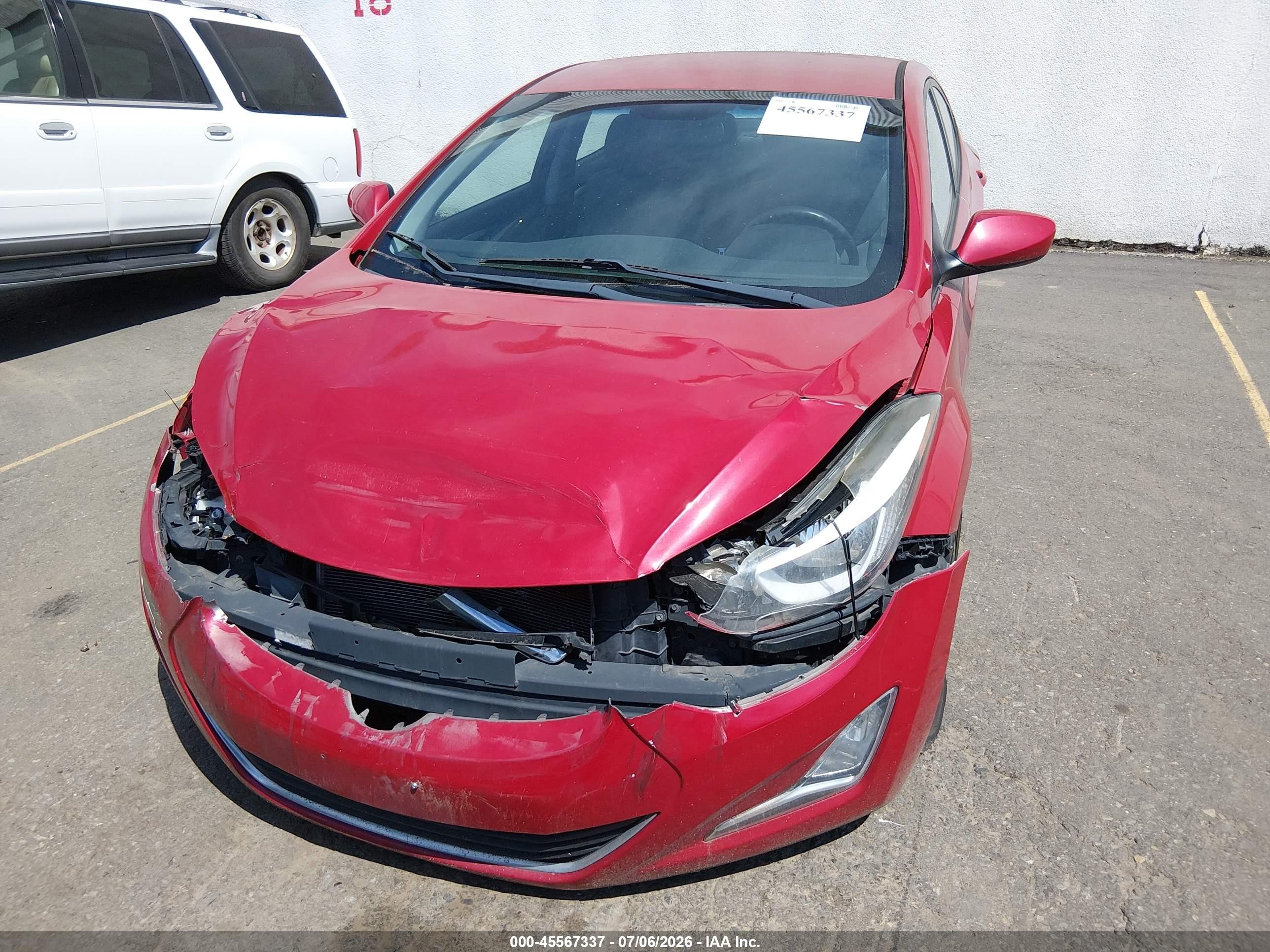2014 Hyundai Elantra VIN KMHDH4AE9EU158067 IAAI salvage auction — Normal Wear, Rebuilt (Washington), sold $100 on 2026-07-09 (photo 6)