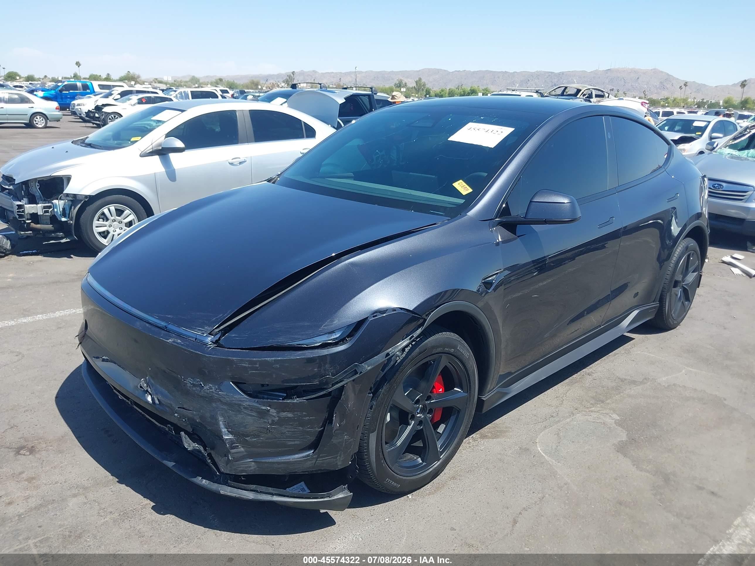 2026 Tesla Model Y VIN 7SAYGDED9TF626172 IAAI salvage auction — Unknown, Salvage (Arizona), sold $25,000 on 2026-08-22 (photo 2)