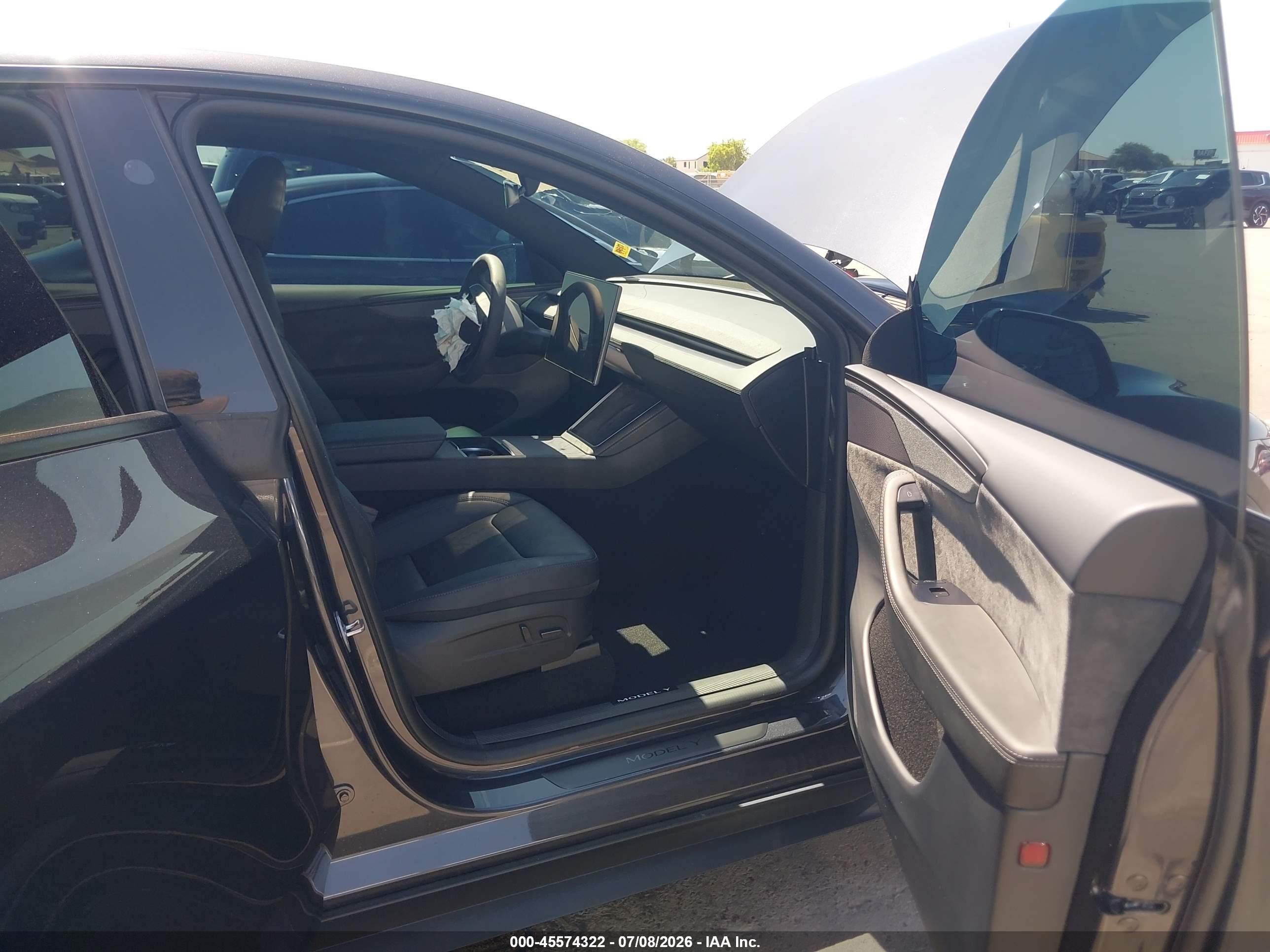 2026 Tesla Model Y VIN 7SAYGDED9TF626172 IAAI salvage auction — Unknown, Salvage (Arizona), sold $25,000 on 2026-08-22 (photo 5)