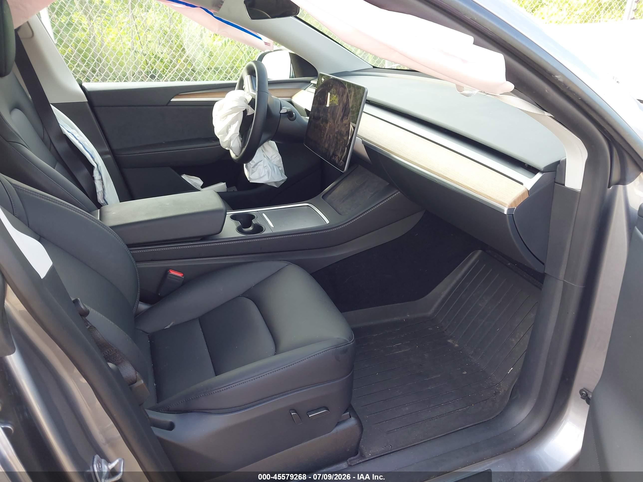 2024 Tesla Model Y VIN 7SAYGDEF6RA320277 IAAI salvage auction — Front End, Salvage (Idaho), sold $9,600 on 2026-09-12 (photo 5)