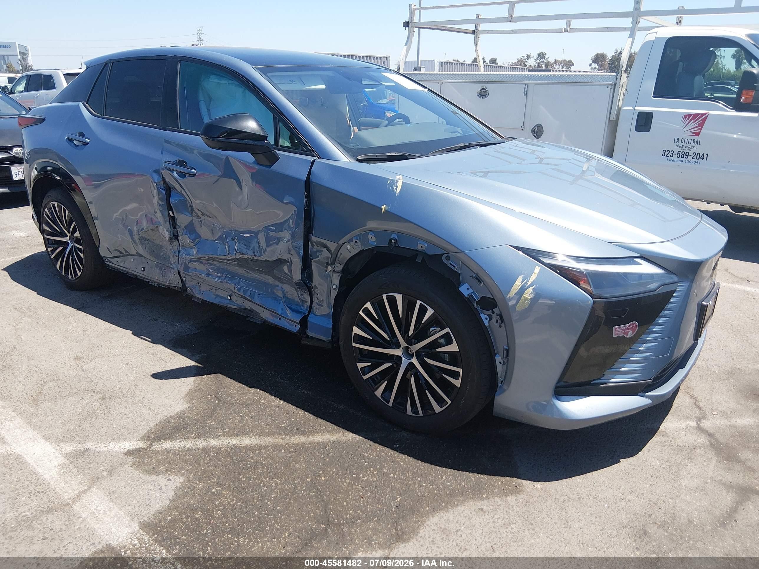 2023 Lexus RZ 450e VIN JTJAAAABXPA014061 — IAAI salvage auction photo