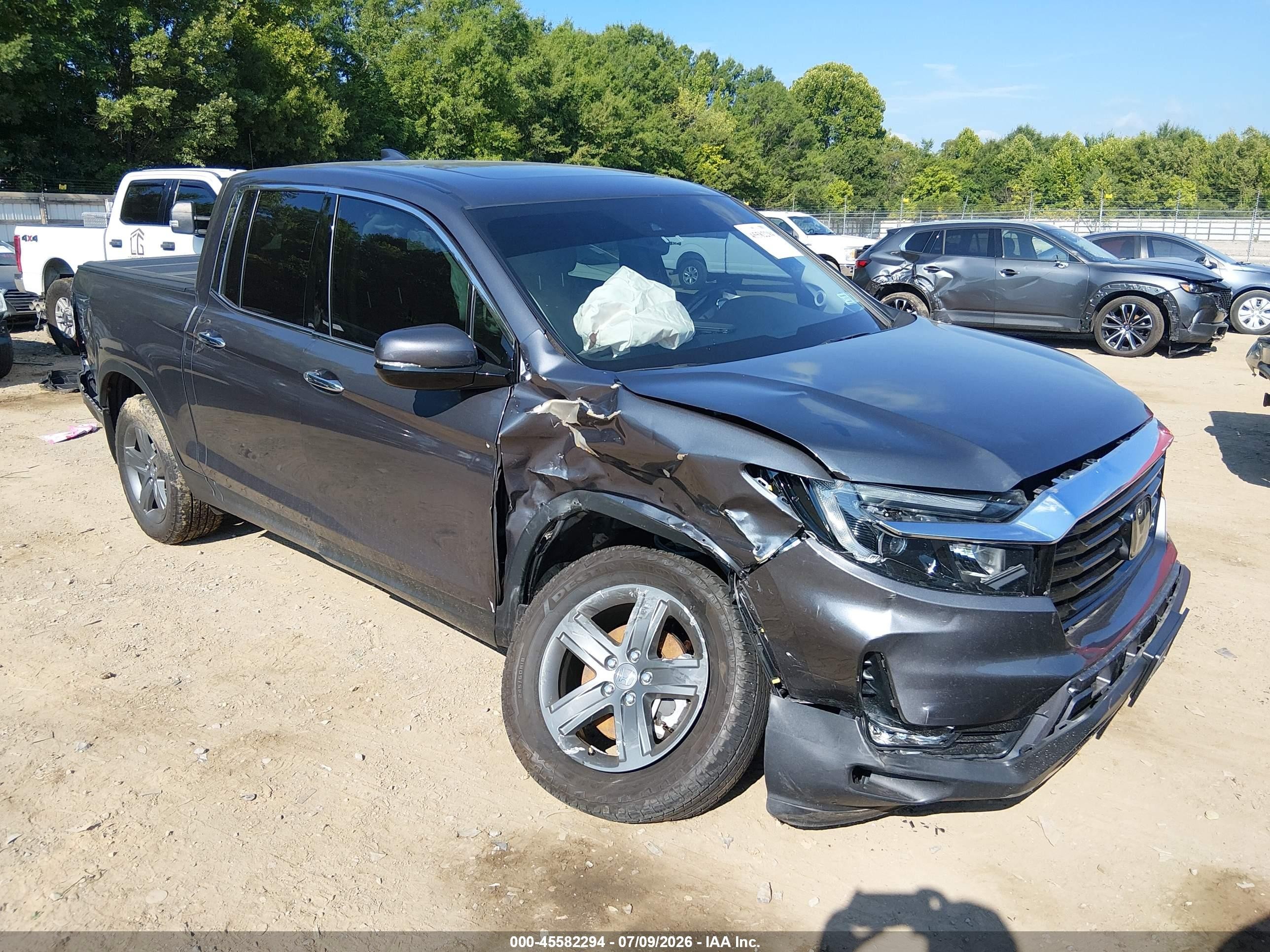 2023 Honda Ridgeline VIN 5FPYK3F7XPB066819 — IAAI salvage auction photo