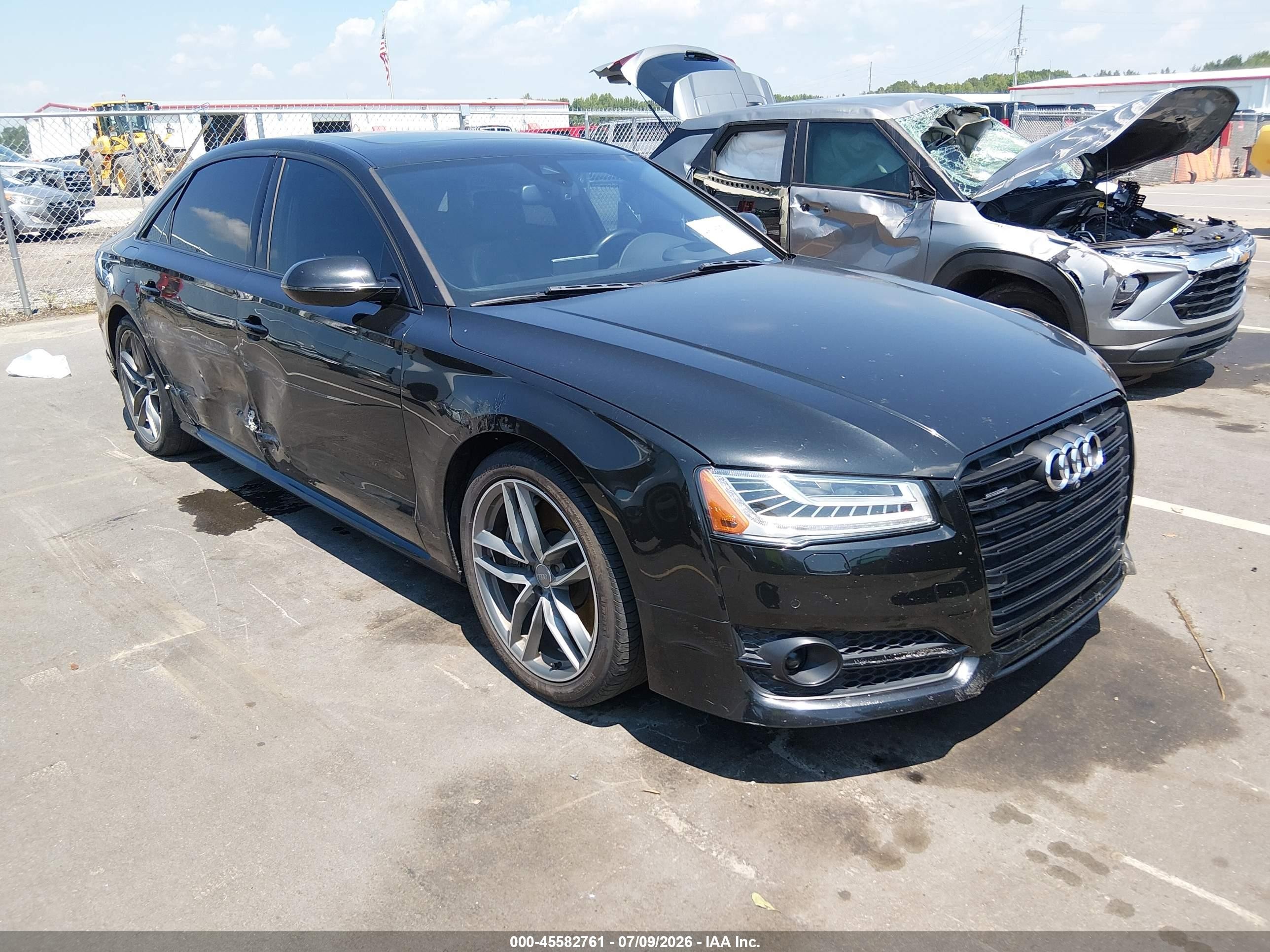 2017 Audi A8 VIN WAU44AFD2HN020512 IAAI salvage auction — Side, Salvage (North Carolina), sold $6,600 on 2026-10-05 (photo 1)