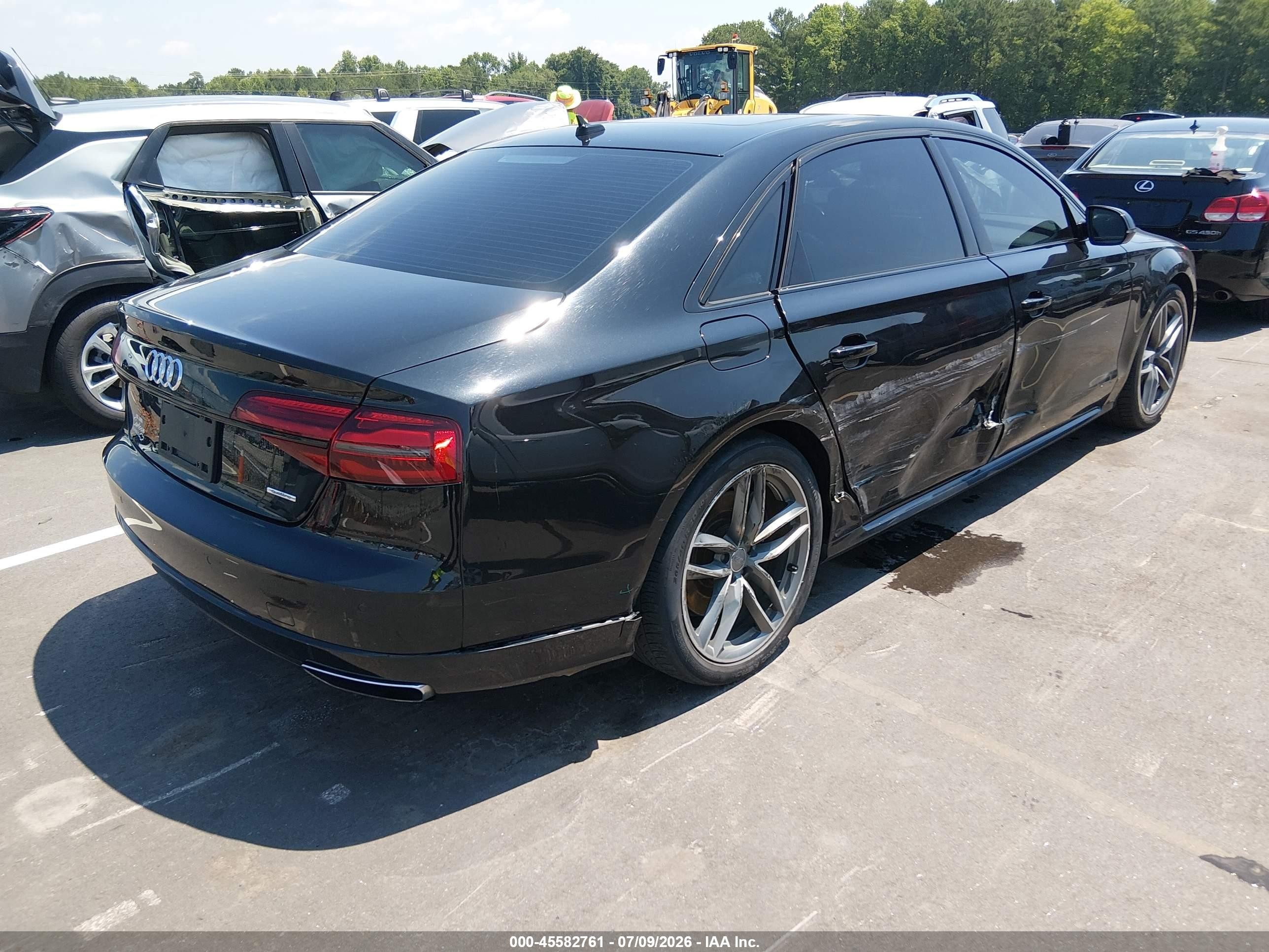 2017 Audi A8 VIN WAU44AFD2HN020512 IAAI salvage auction — Side, Salvage (North Carolina), sold $6,600 on 2026-10-05 (photo 4)