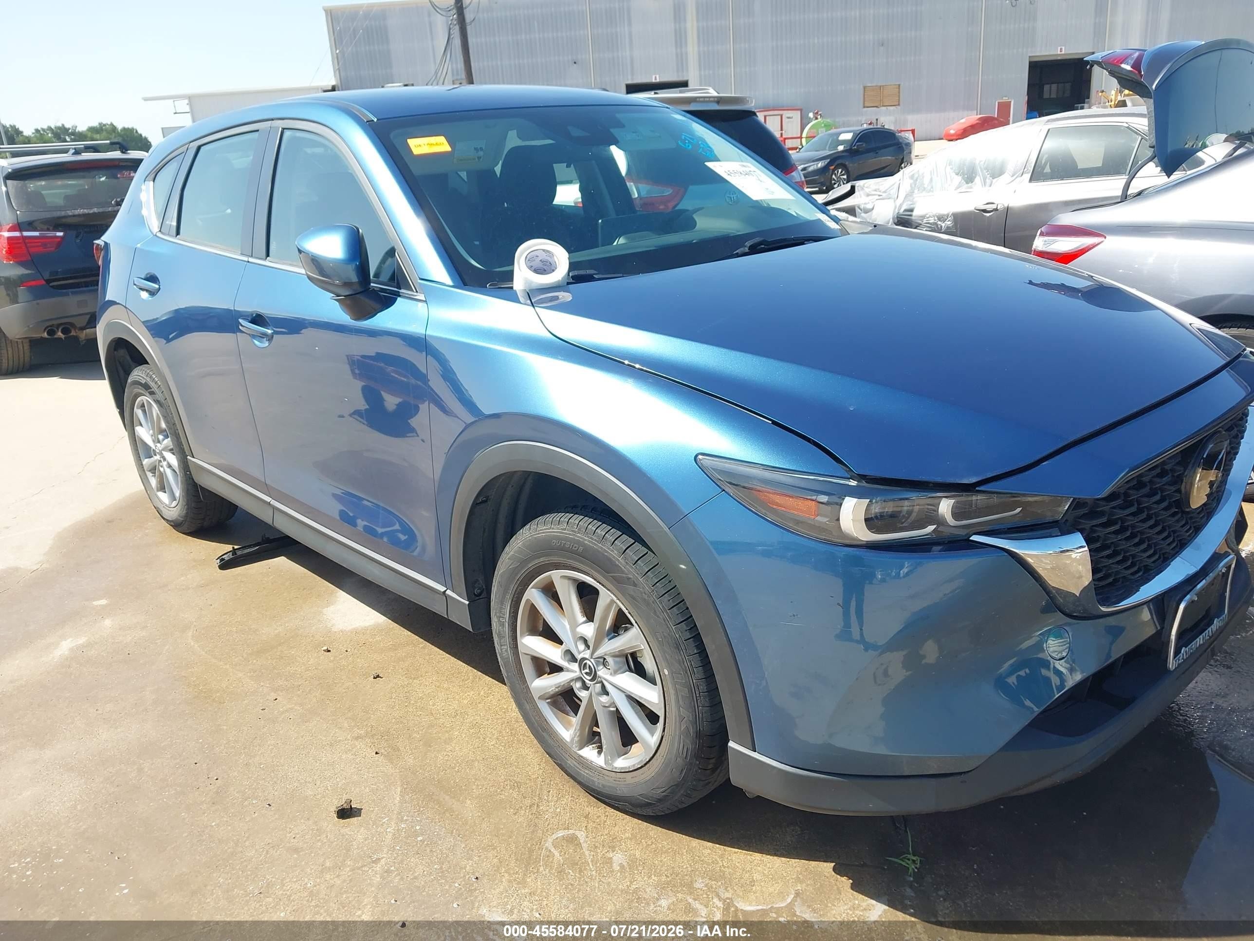 2022 Mazda CX-5 VIN JM3KFBAM3N0642201 — IAAI salvage auction photo