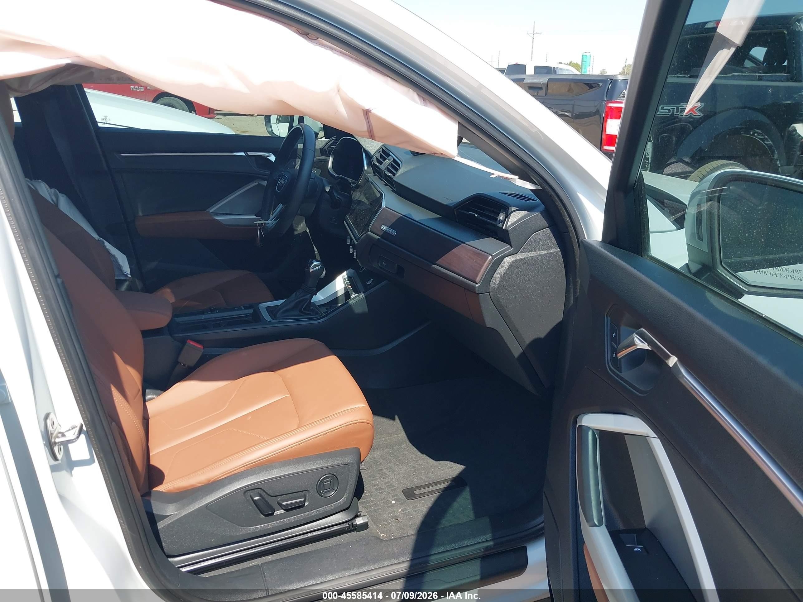 2024 Audi Q3 VIN WA1BUCF33R1051185 IAAI salvage auction — Side, Salvage (Texas), sold $13,300 on 2026-09-25 (photo 5)