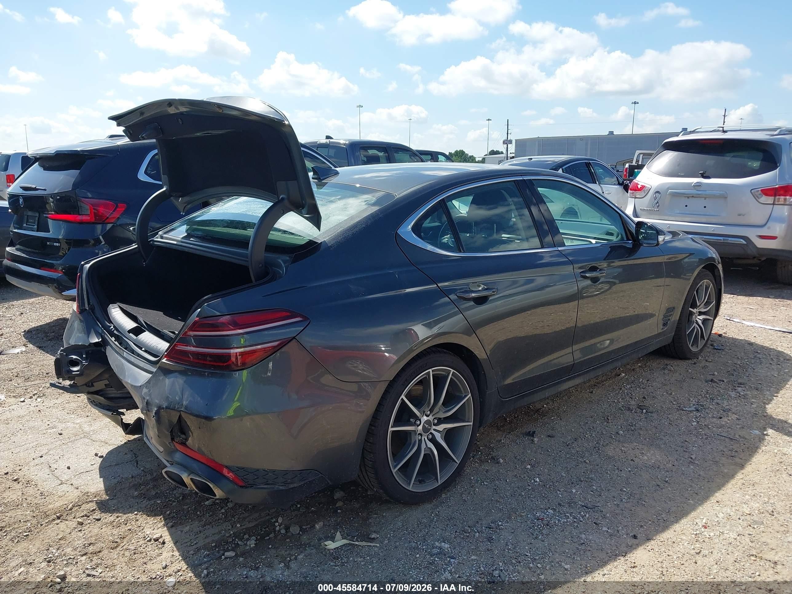 2023 Genesis G70 VIN KMTG34TA9PU131174 IAAI salvage auction — Rear End, Original (Texas), sold $8,950 on 2026-10-02 (photo 4)