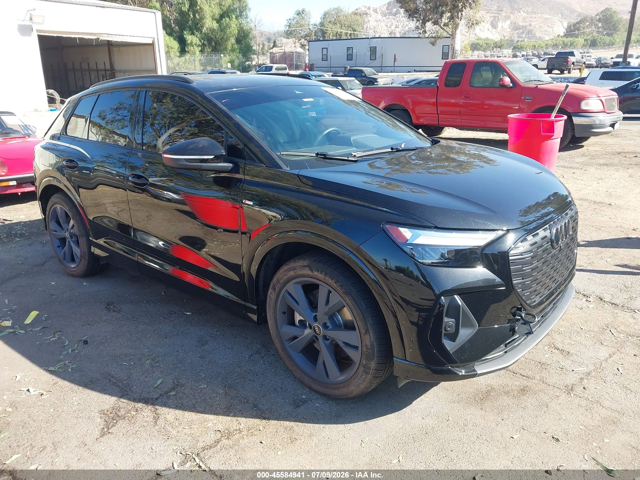 2025 Audi Q4 e-tron VIN WA1KUBFZ5SP001180 — IAAI salvage auction photo