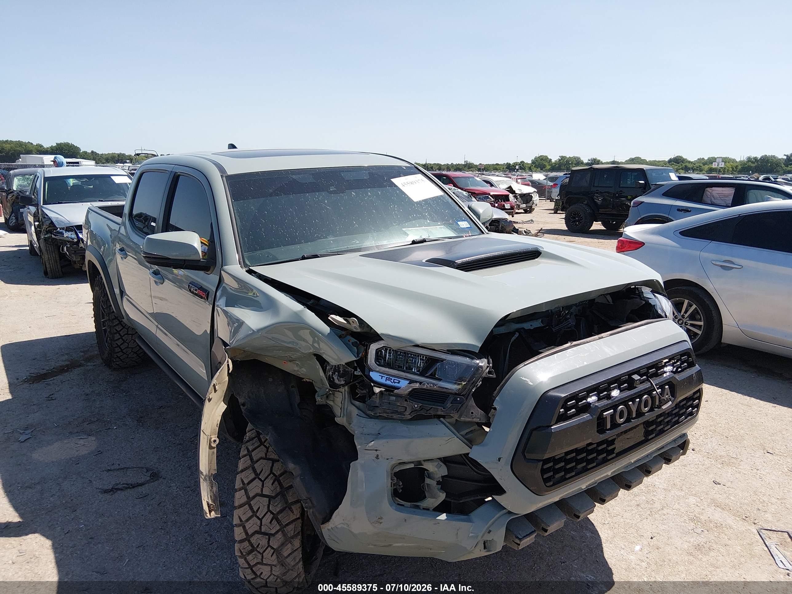 2021 Toyota Tacoma VIN 5TFCZ5AN7MX247345 — IAAI salvage auction photo