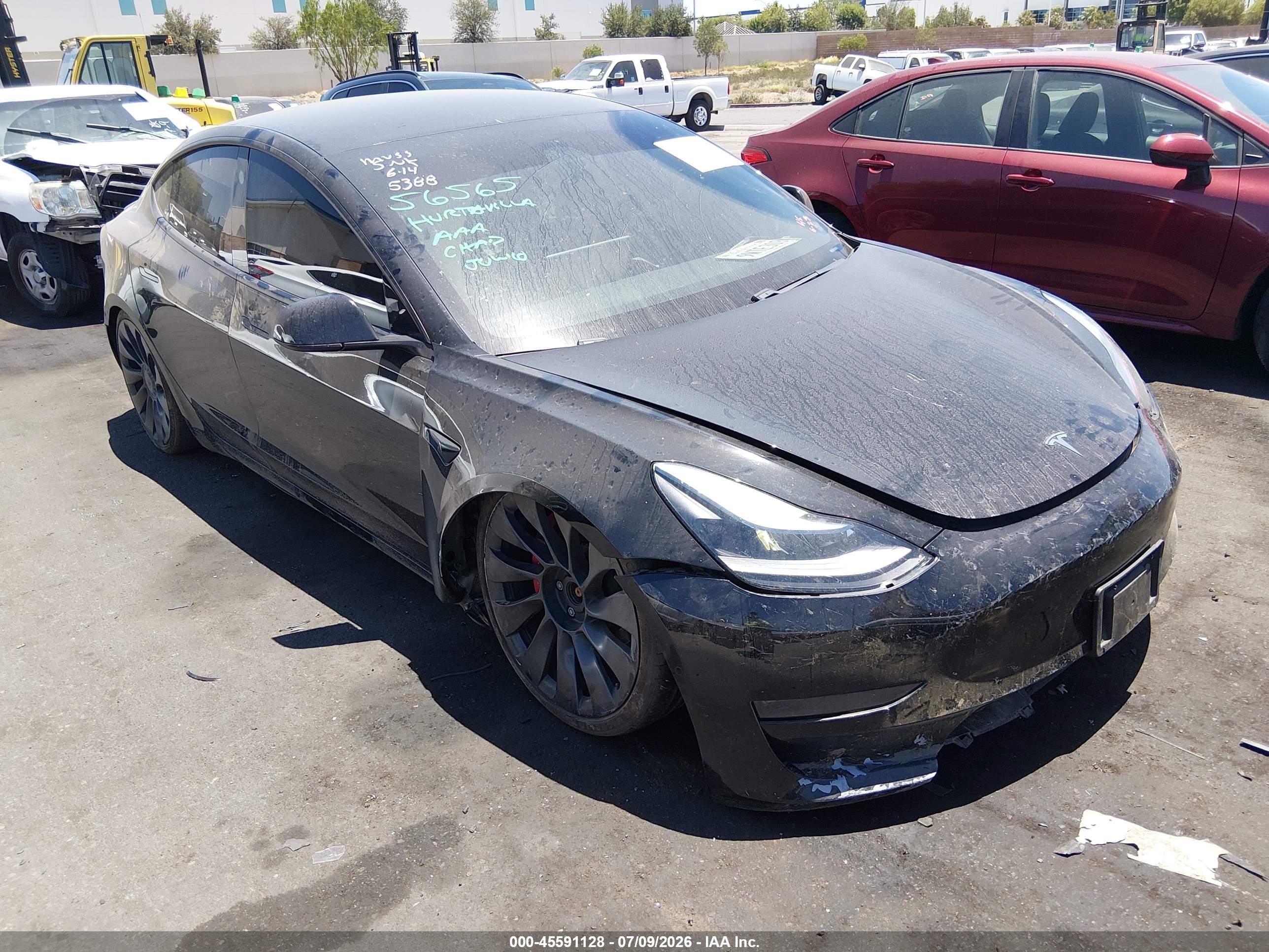 2021 Tesla Model 3 VIN 5YJ3E1EC9MF925388 — IAAI salvage auction photo