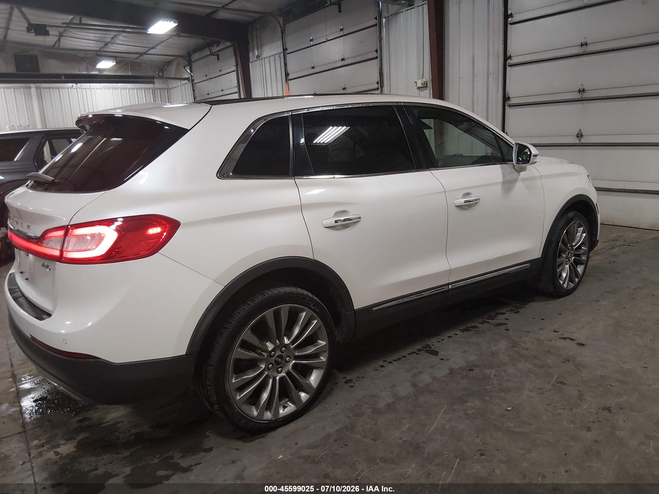 2016 Lincoln Mkx VIN 2LMPJ8LR2GBL57001 IAAI salvage auction — Hail, Salvage (Iowa), sold $2,850 on 2026-09-23 (photo 4)