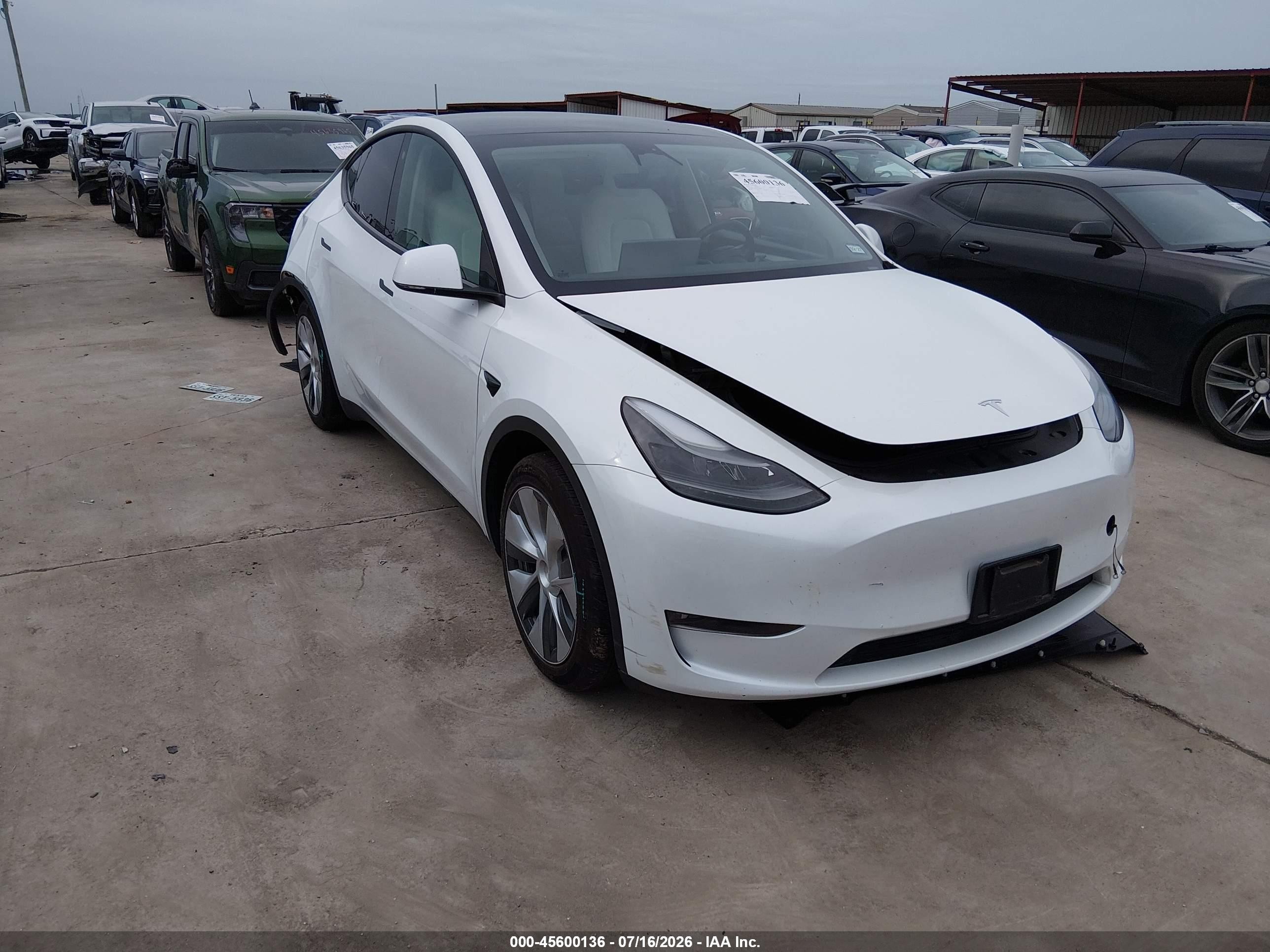 2023 Tesla Model y VIN 7SAYGAEE7PF682561 IAAI salvage auction — Rear End, Salvage (Texas), sold $13,100 on 2026-09-29 (photo 1)