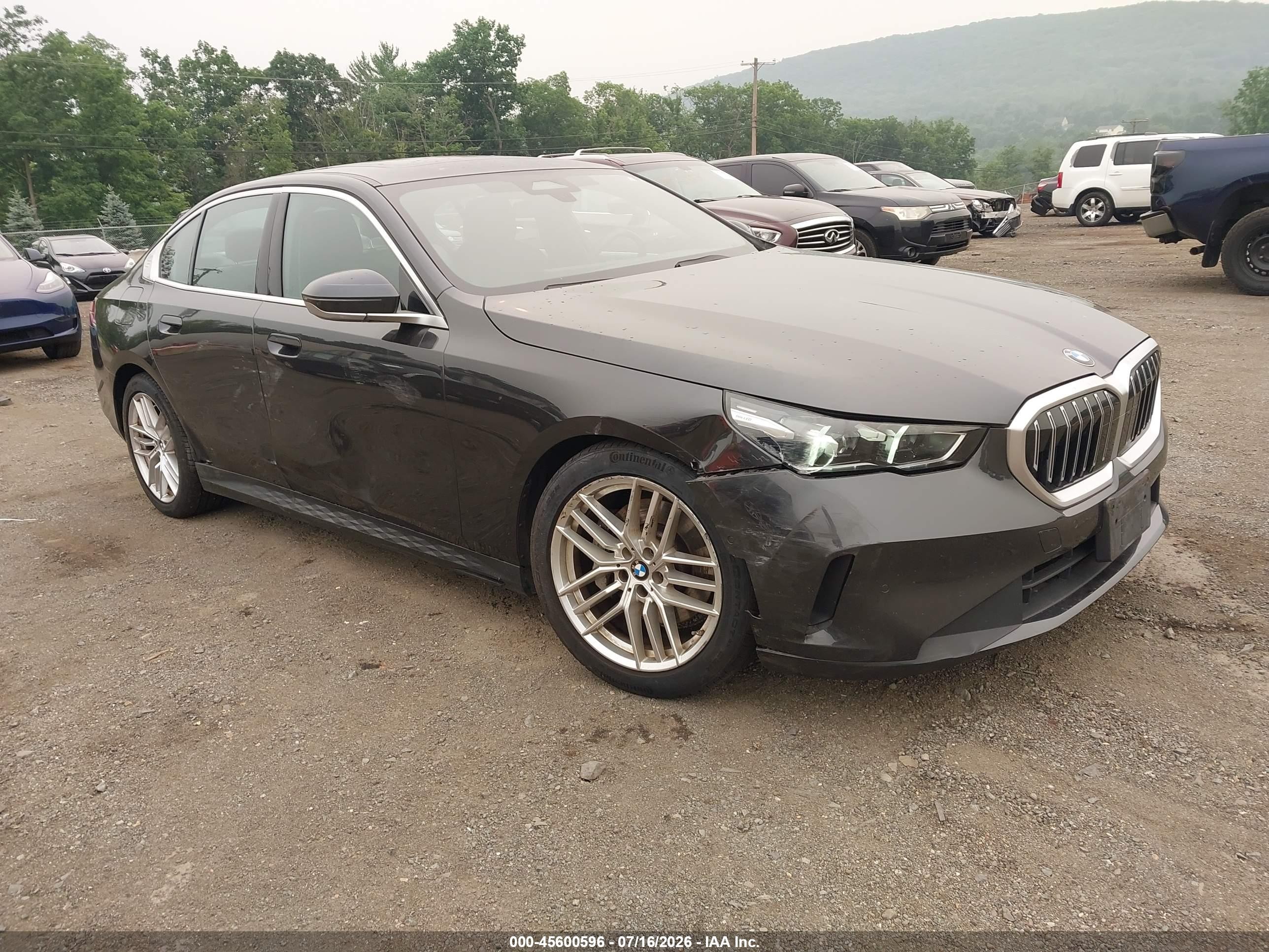 2024 BMW 5er VIN WBA53FJ04RCP92810 IAAI salvage auction — Side, Salvage (Idaho), sold $20,000 on 2026-08-20 (photo 1)