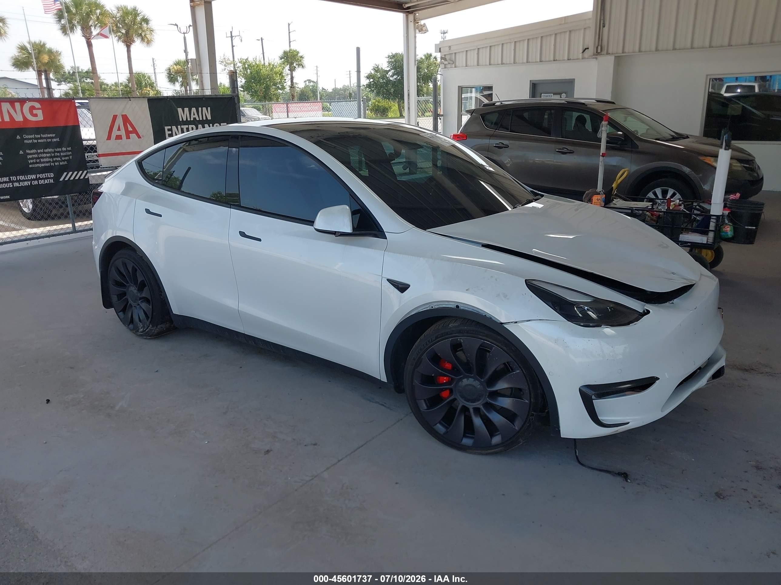 2022 Tesla Model y VIN 7SAYGDEF9NF380762 IAAI salvage auction — Front End, Rebuildable (Florida), sold $10,600 on 2026-09-04 (photo 1)
