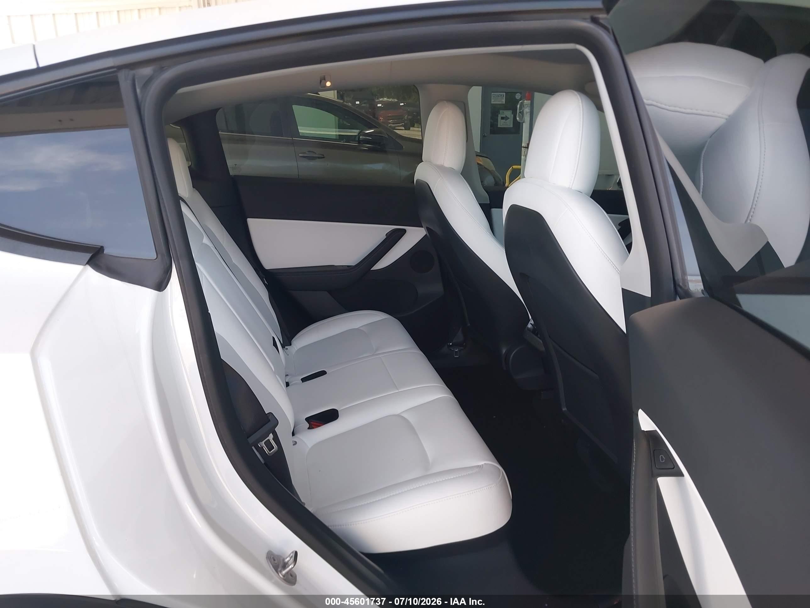 2022 Tesla Model y VIN 7SAYGDEF9NF380762 IAAI salvage auction — Front End, Rebuildable (Florida), sold $10,600 on 2026-09-04 (photo 8)